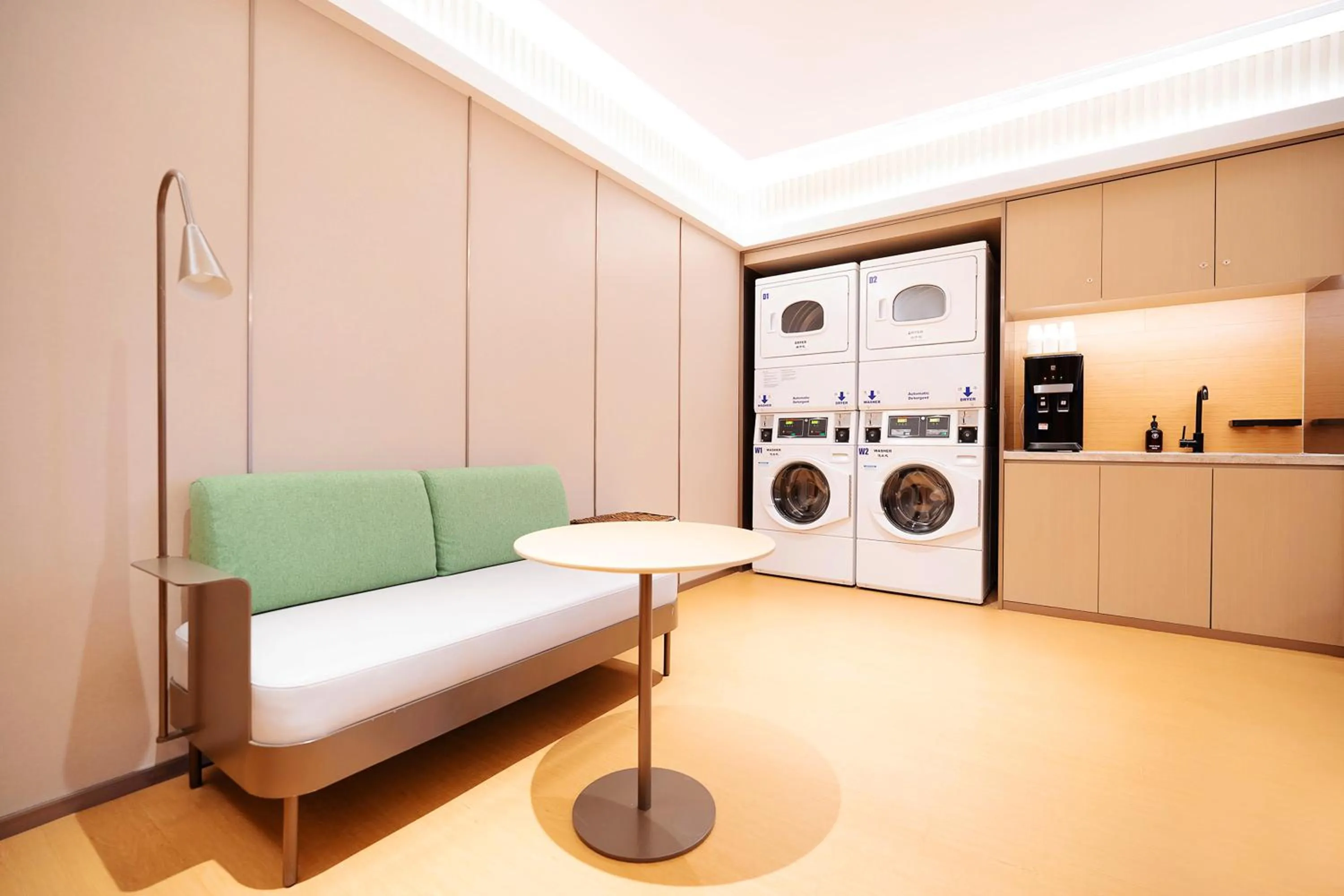 Seating area, Bed in Ji Hotel Orchard Singapore