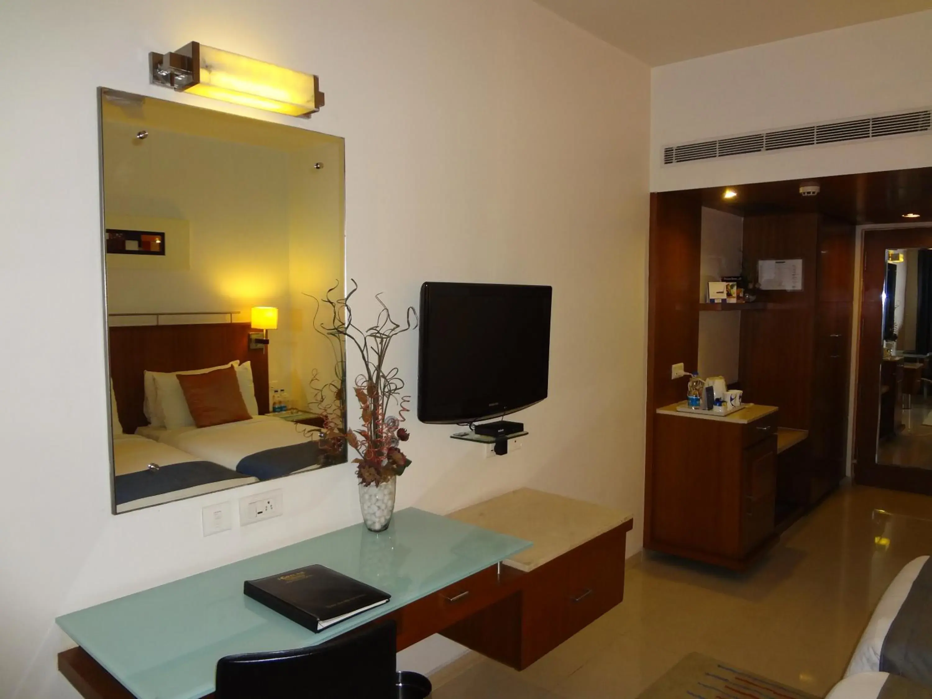 Bedroom, TV/Entertainment Center in Fortune Inn Sree Kanya Visakhapatnam Bedroom, TV/Entertainment Center in Fortune Inn Sree Kanya Visakhapatnam