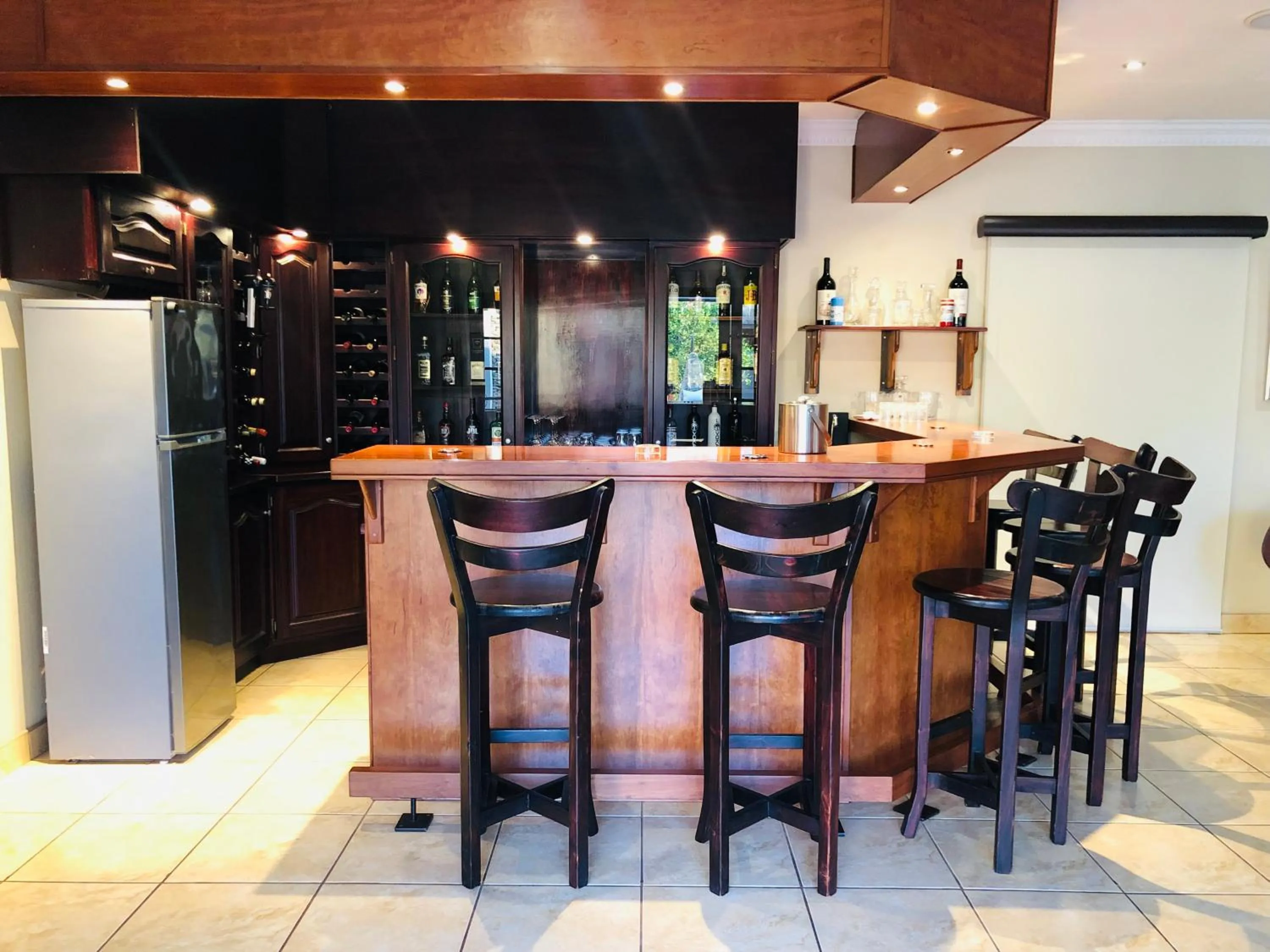 Lounge or bar in Wild Dog Guest Lodge