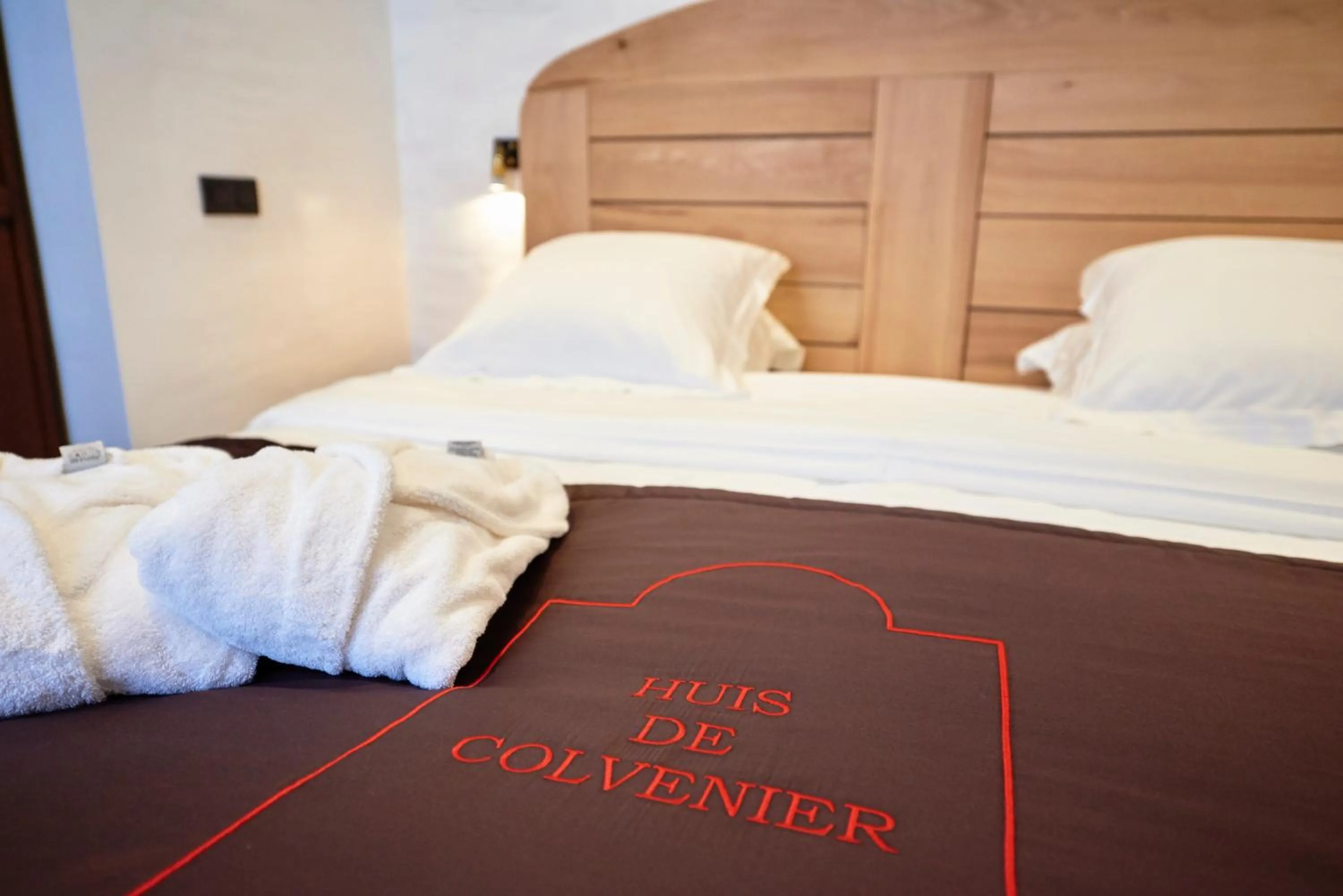 Bed in Hotel Colvenier