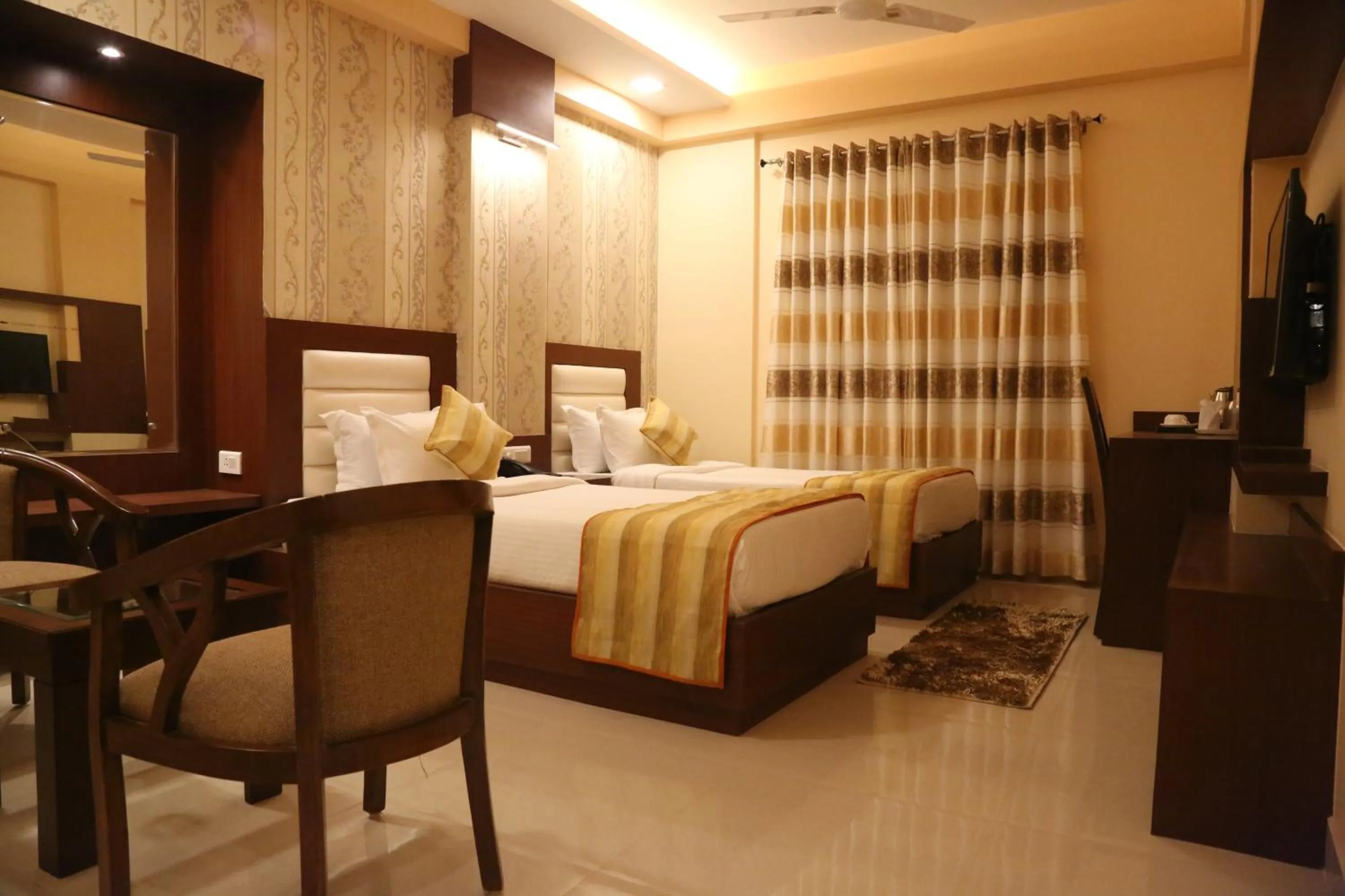 Bed in Hotel Varanasi Inn