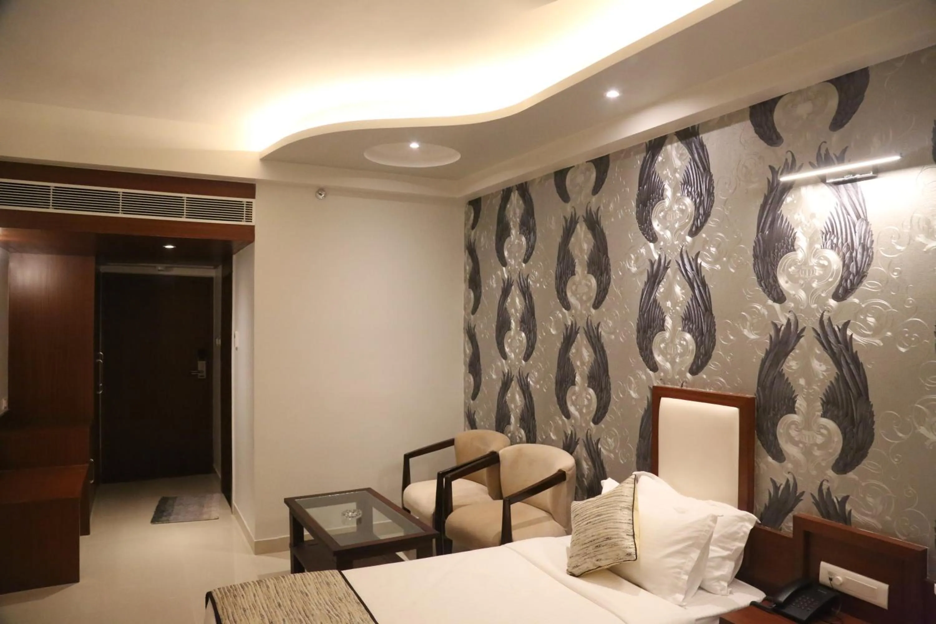 Bed in Hotel Varanasi Inn