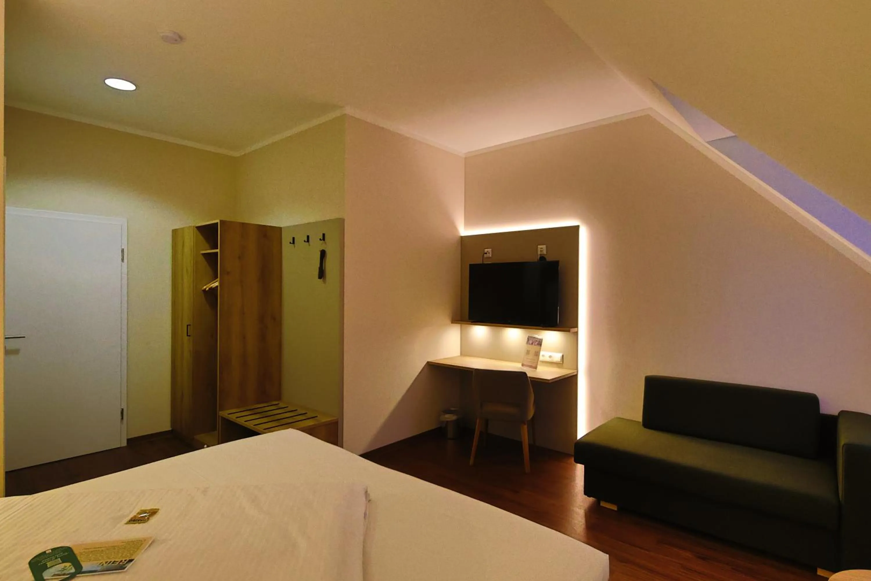 Photo of the whole room, Bed in Weinhotel Wasem