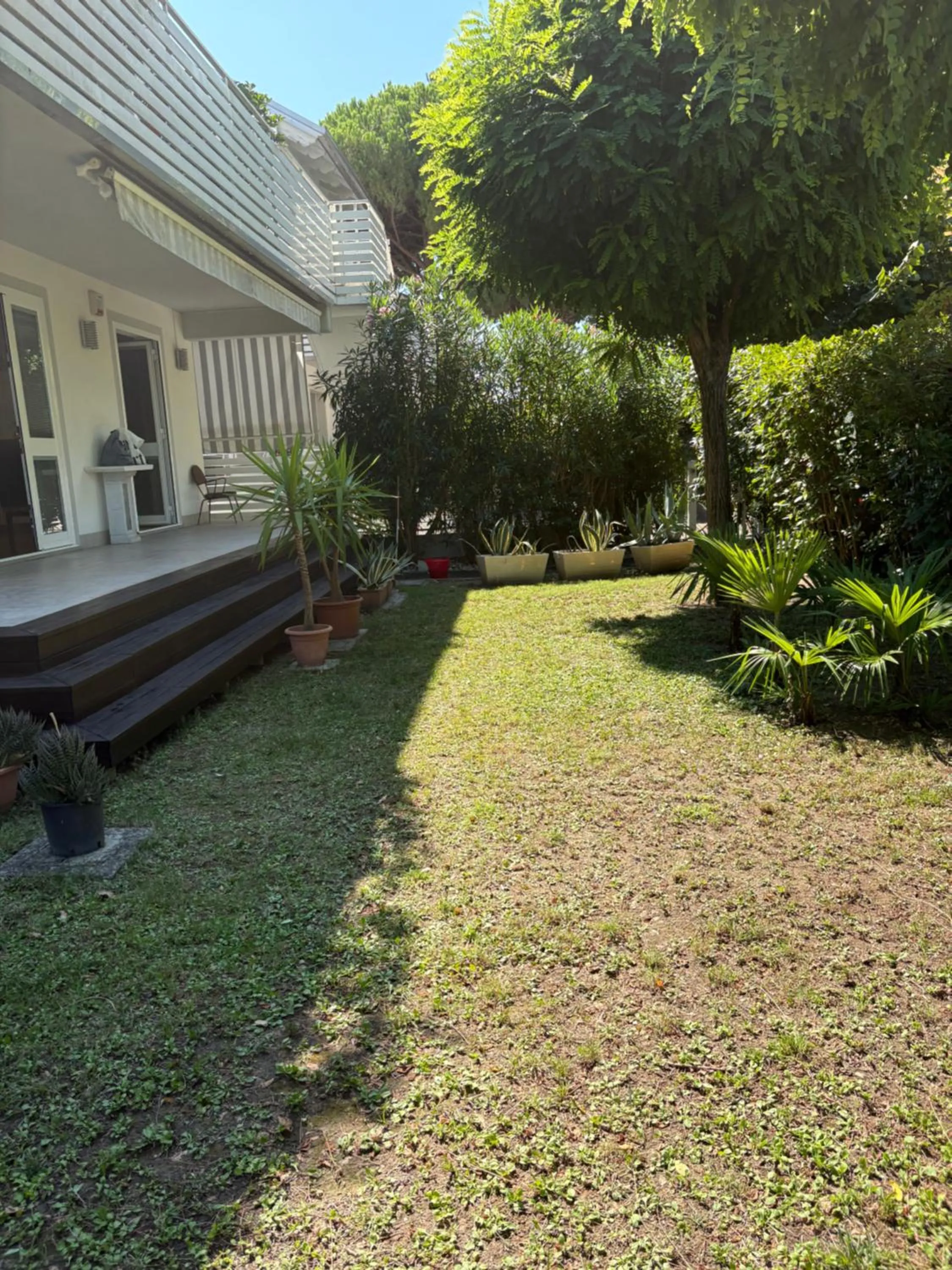 Casa con giardino