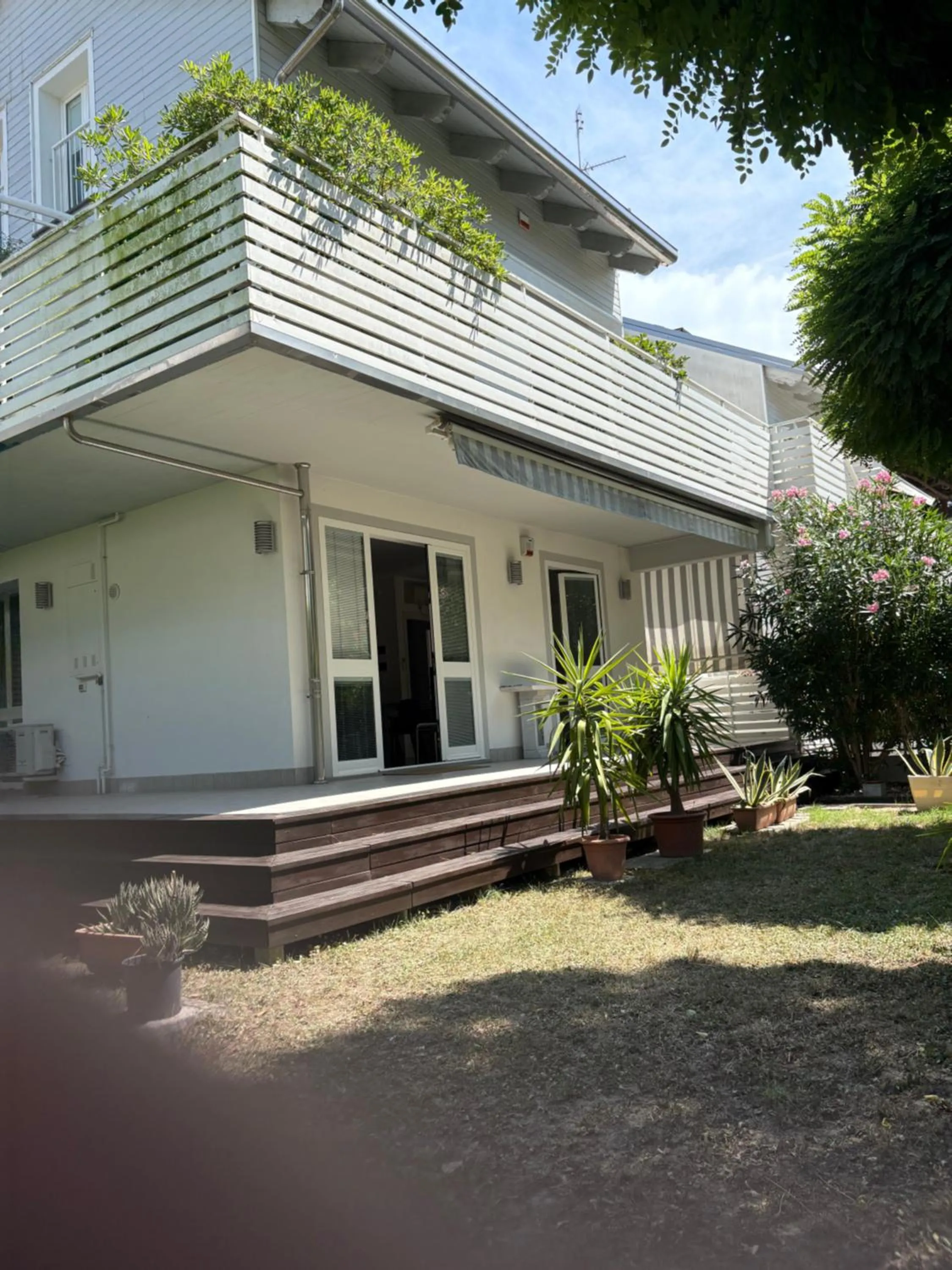 Casa con giardino