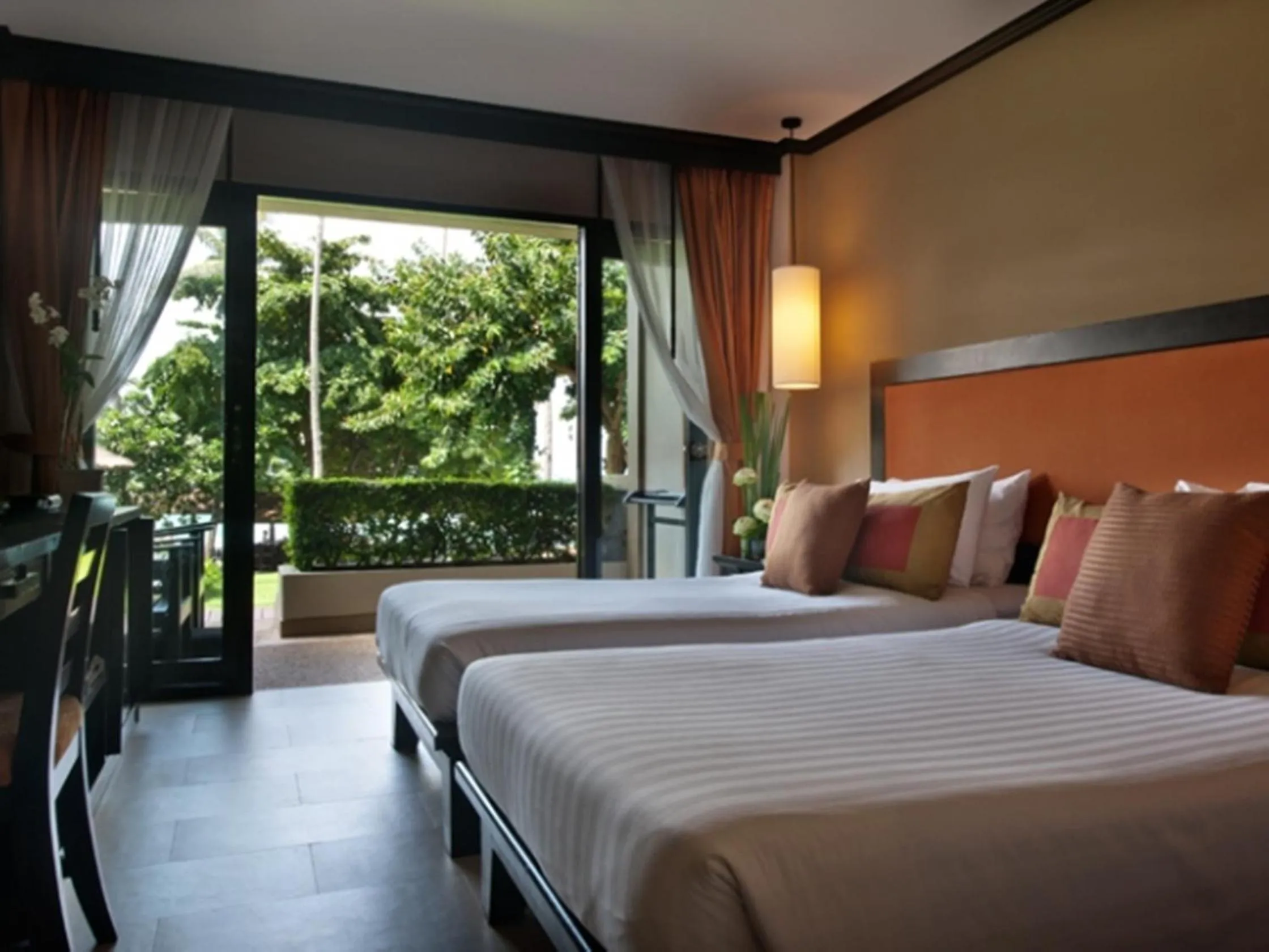 Bed in Impiana Beachfront Resort Chaweng Noi, Koh Samui