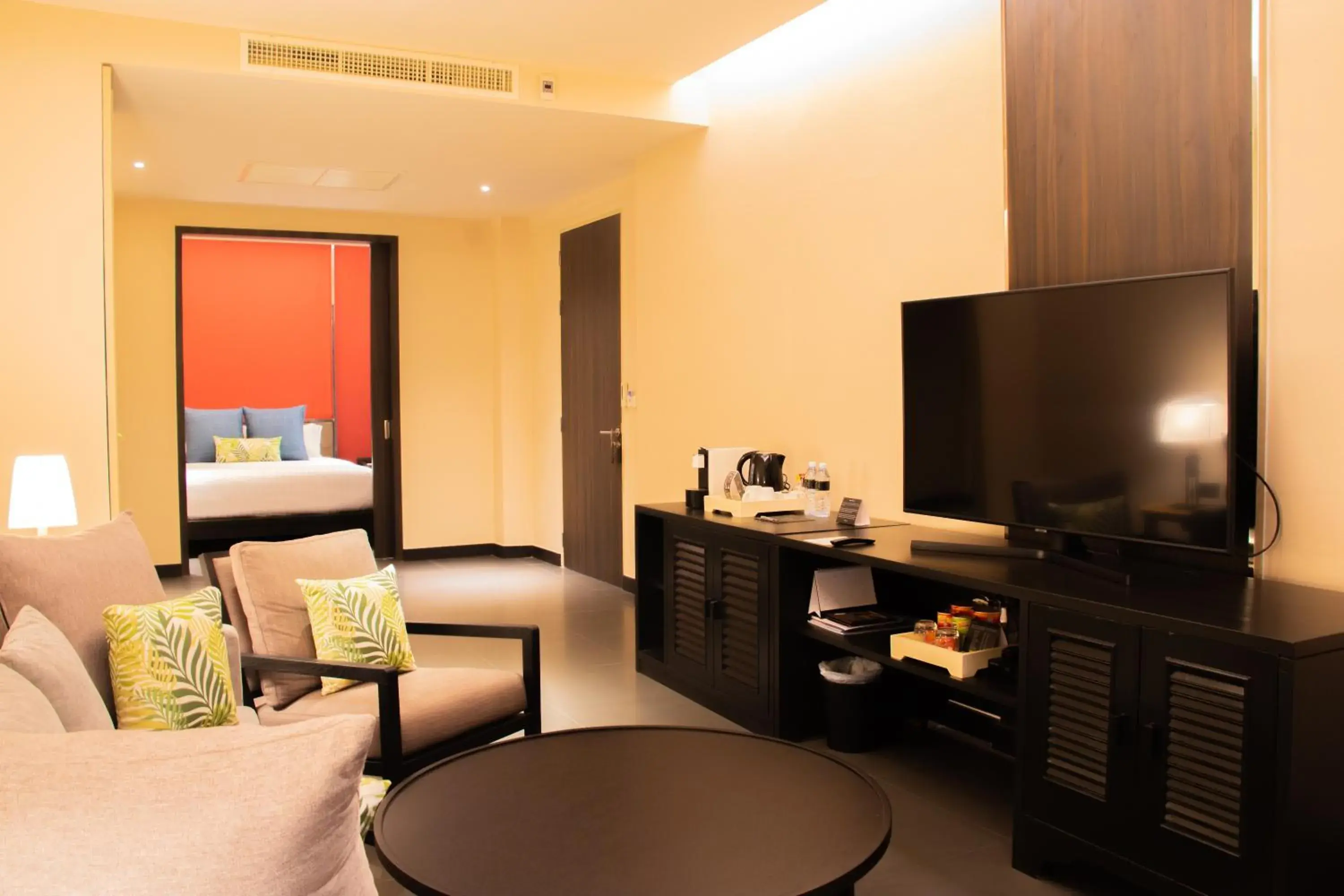 Living room, Bed in Impiana Beachfront Resort Chaweng Noi, Koh Samui Living room, Bed in Impiana Beachfront Resort Chaweng Noi, Koh Samui