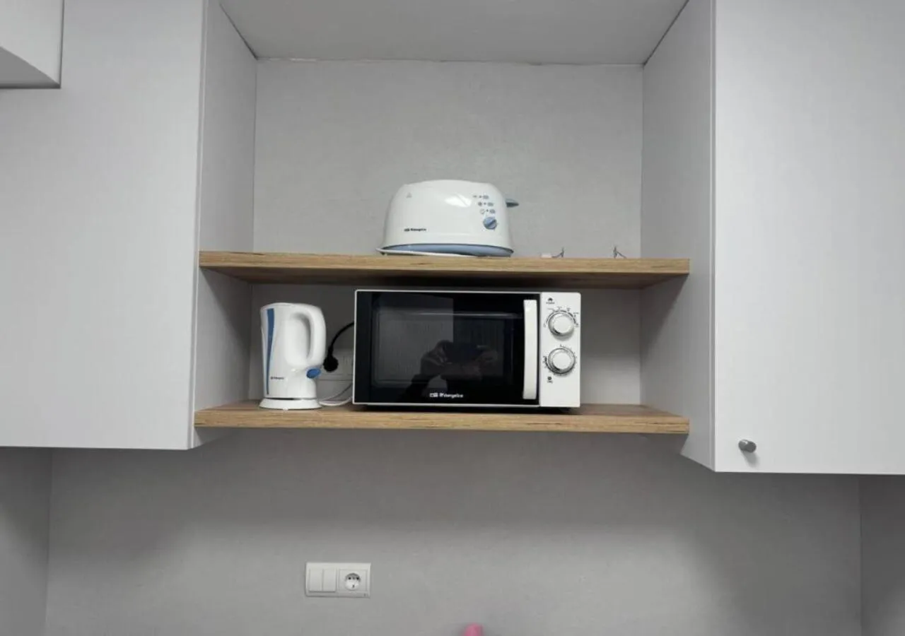 microwave in Hotel Cenit & Apts Sol y Viento