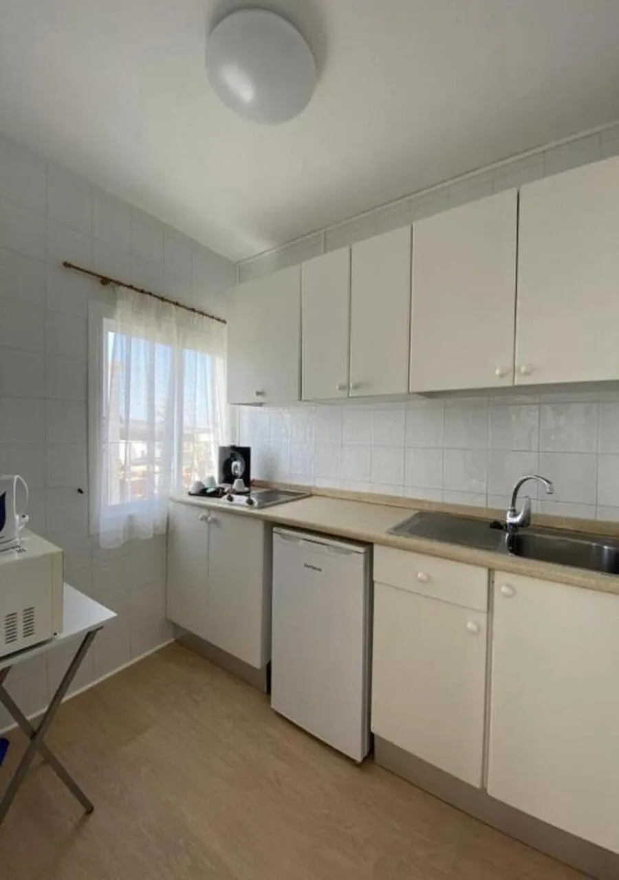 Kitchen or kitchenette in Hotel Cenit & Apts Sol y Viento