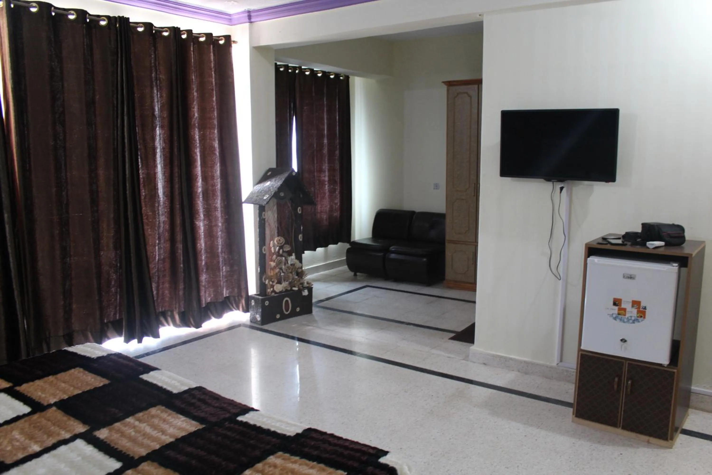 Communal lounge/ TV room in Muzaffarabad View Motel