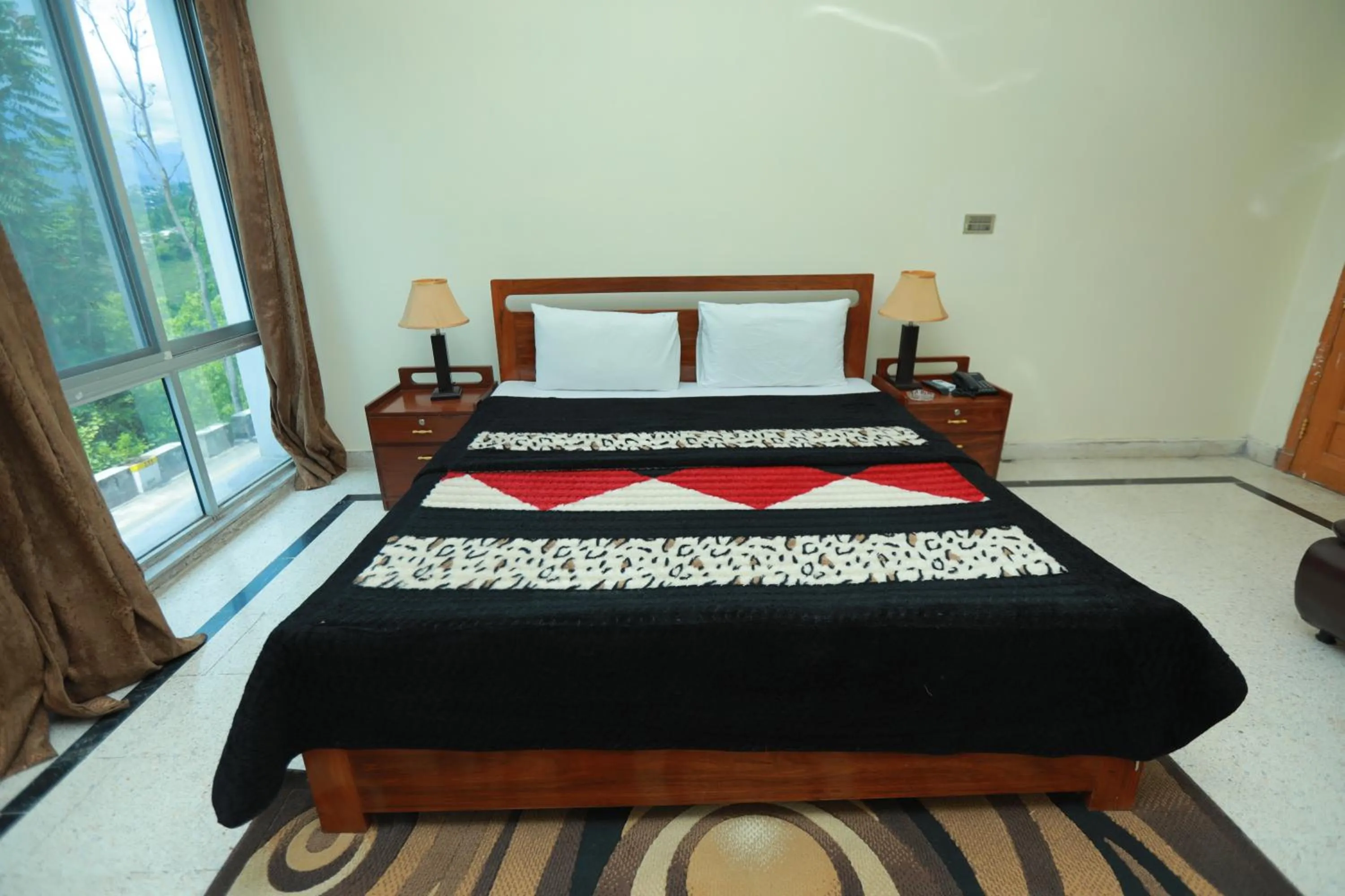 Bed in Muzaffarabad View Motel