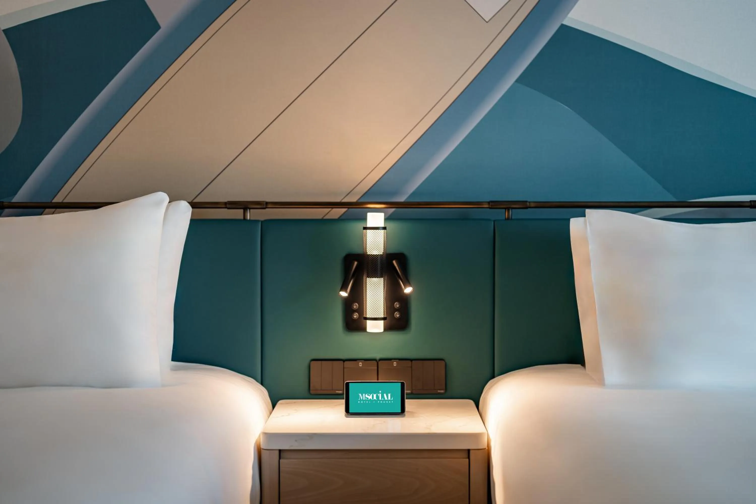 Bed in M Social Hotel Phuket