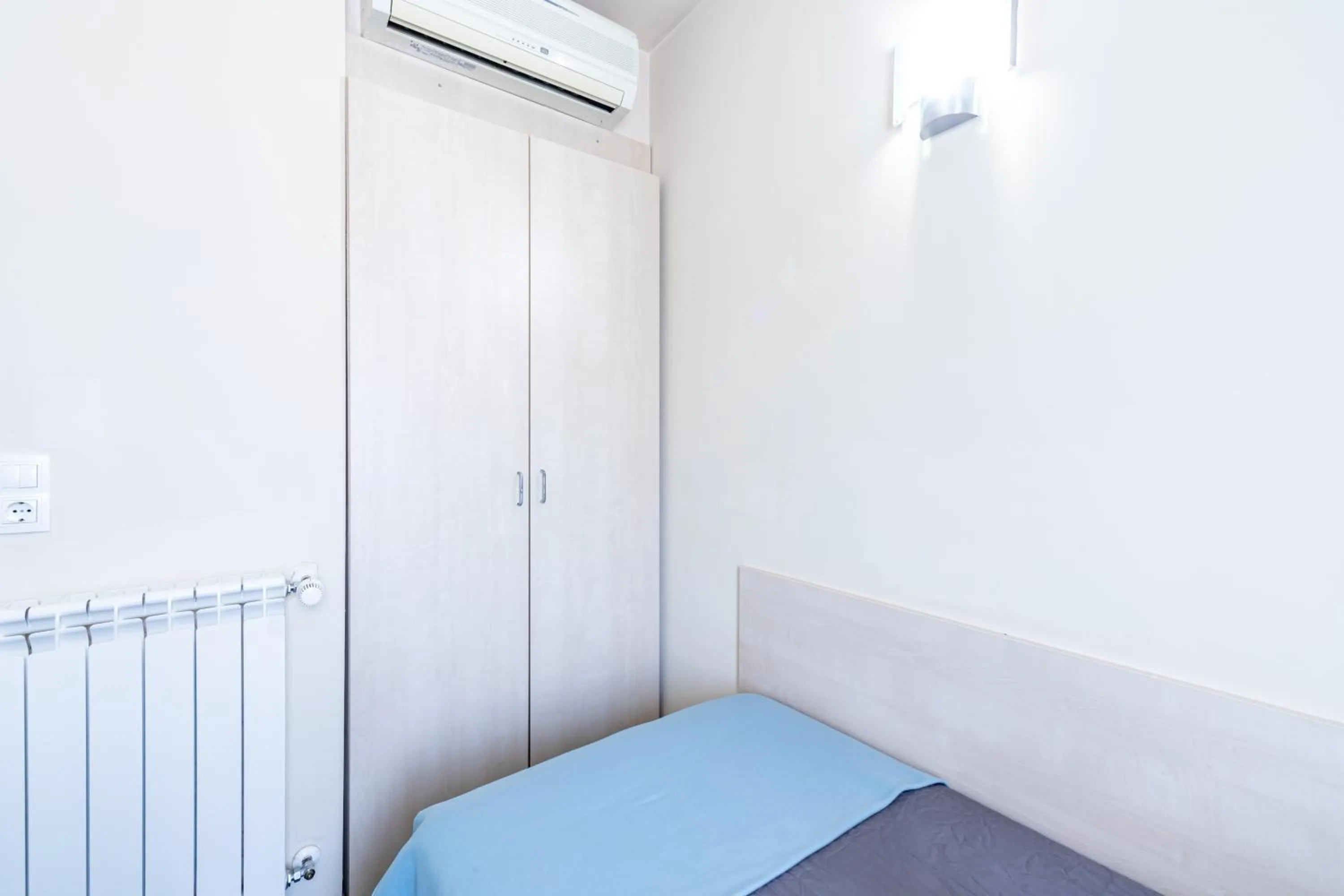 Bed in Residencia Universitaria Resa Giner de Los Ríos