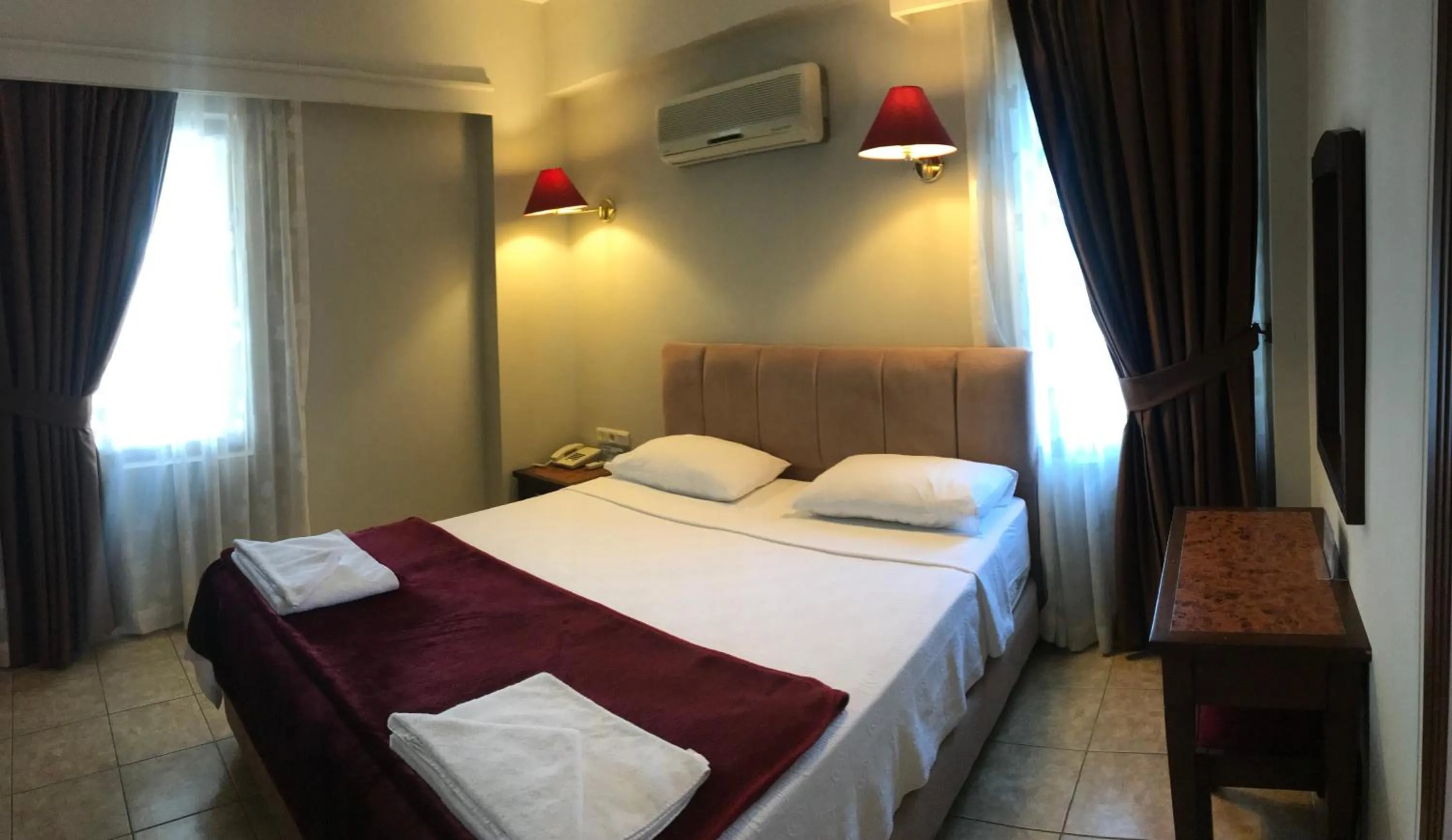 Decorative detail, Bed in Mr. Dim Exclusive Apart Hotel