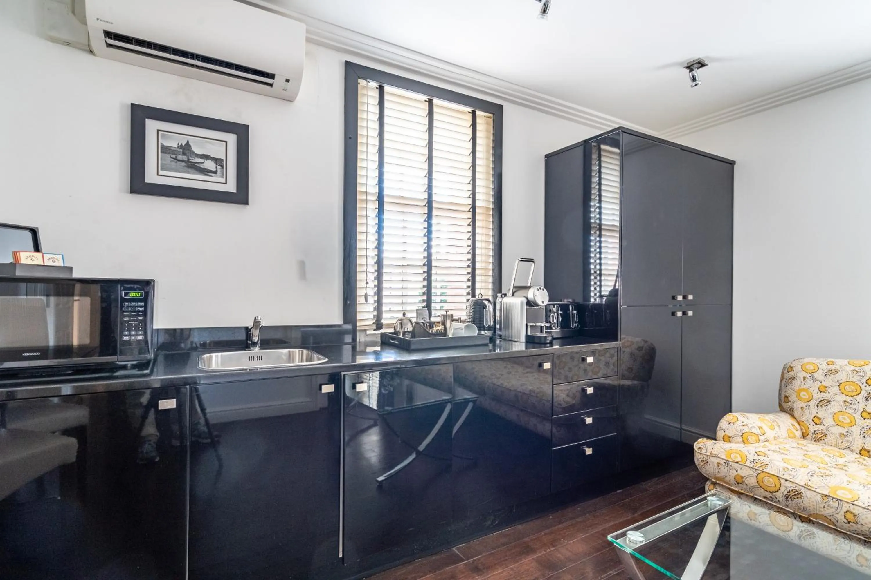 Kitchen or kitchenette in Strozzi Palace Suites by Mansley