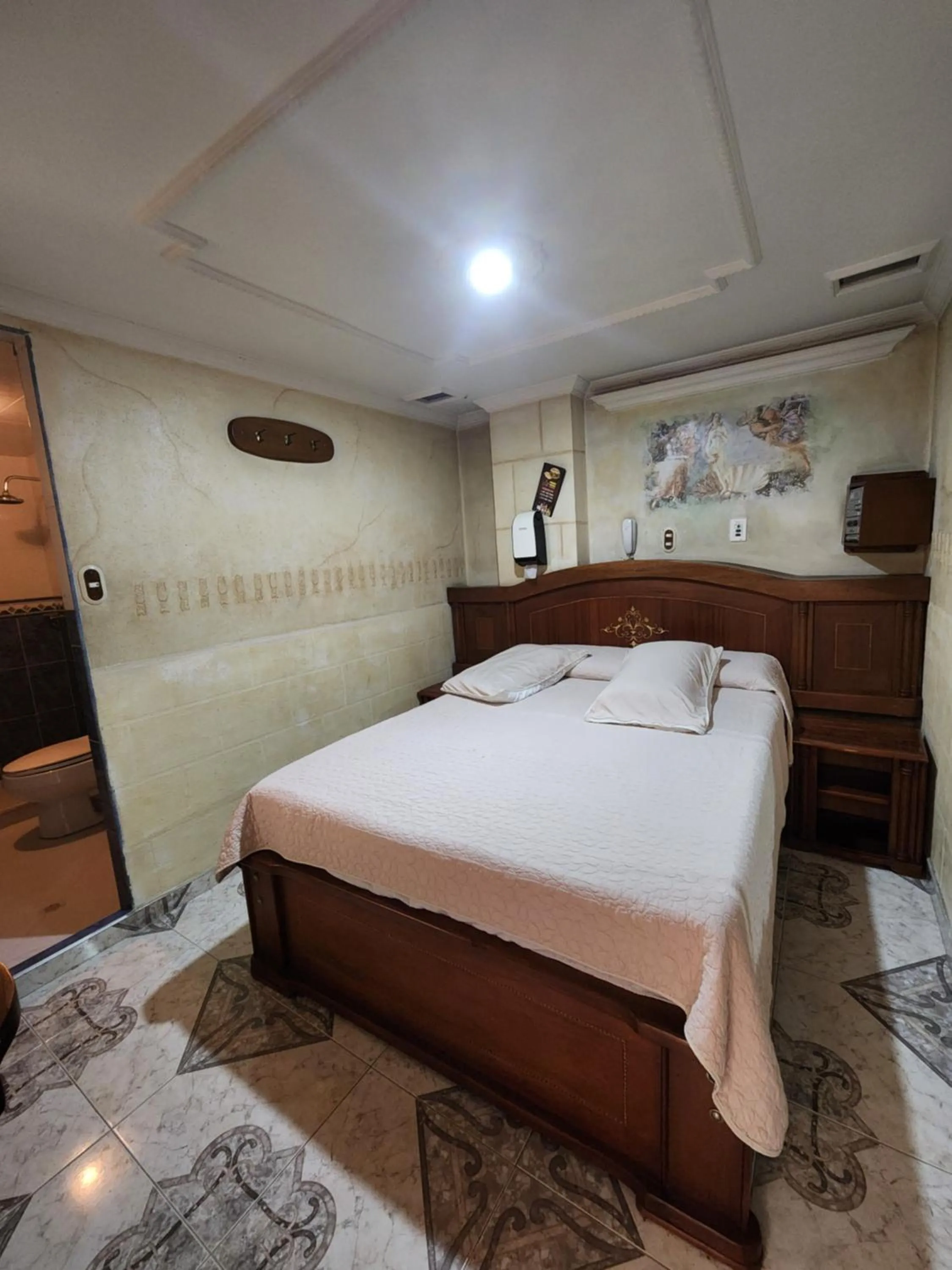 Bed in Motel Piramides De Cristal