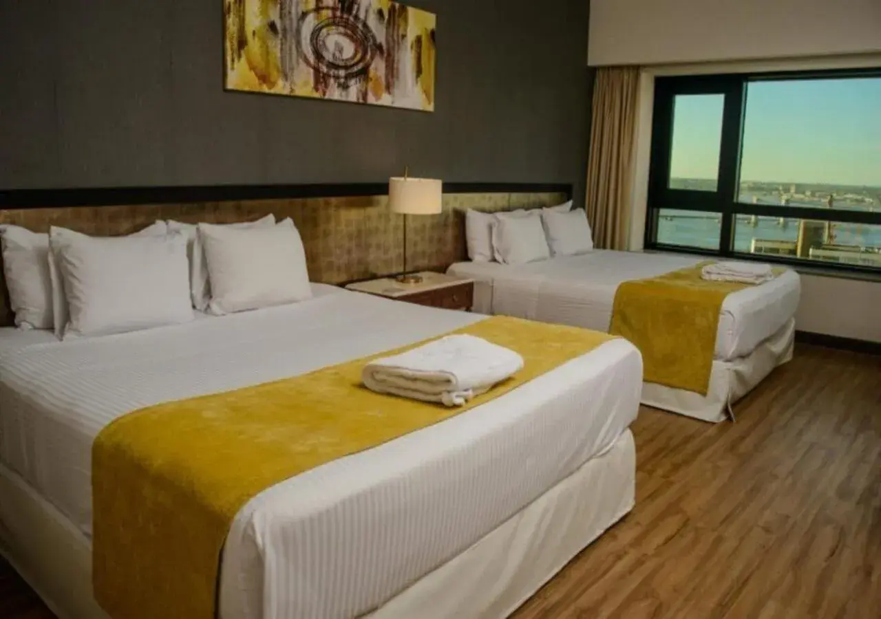 Premium King Room with Two King Beds and Bay View in Radisson Montevideo Victoria Plaza Hotel Premium King Room with Two King Beds and Bay View in Radisson Montevideo Victoria Plaza Hotel