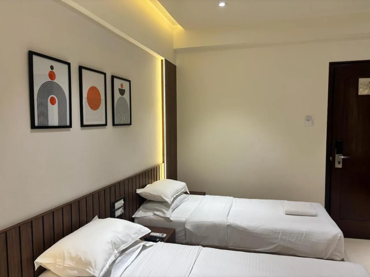 Bed in Hotel Karl Residency