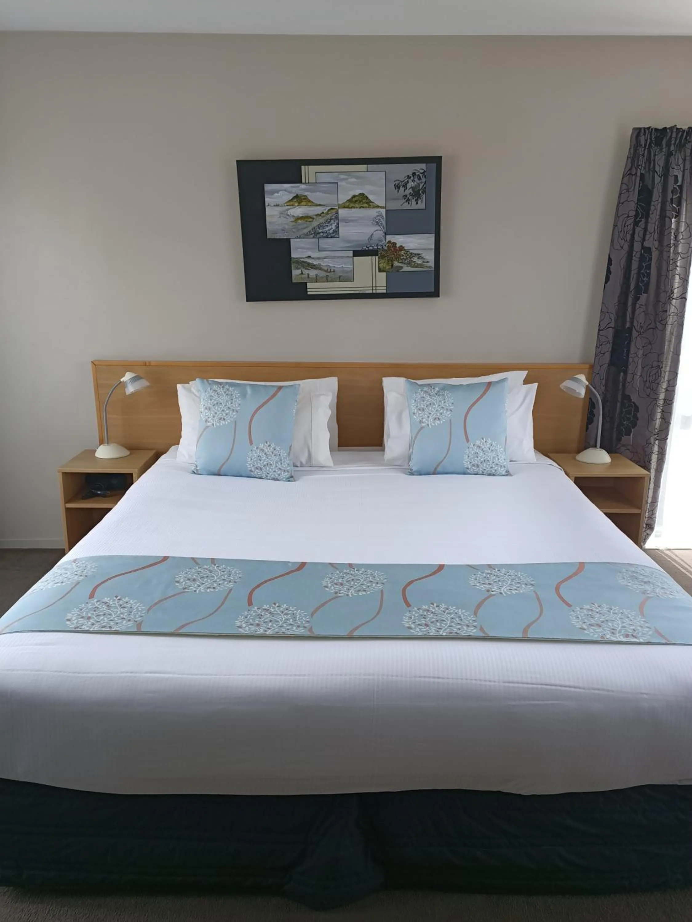 Bed in ASURE Macy's Motor Inn