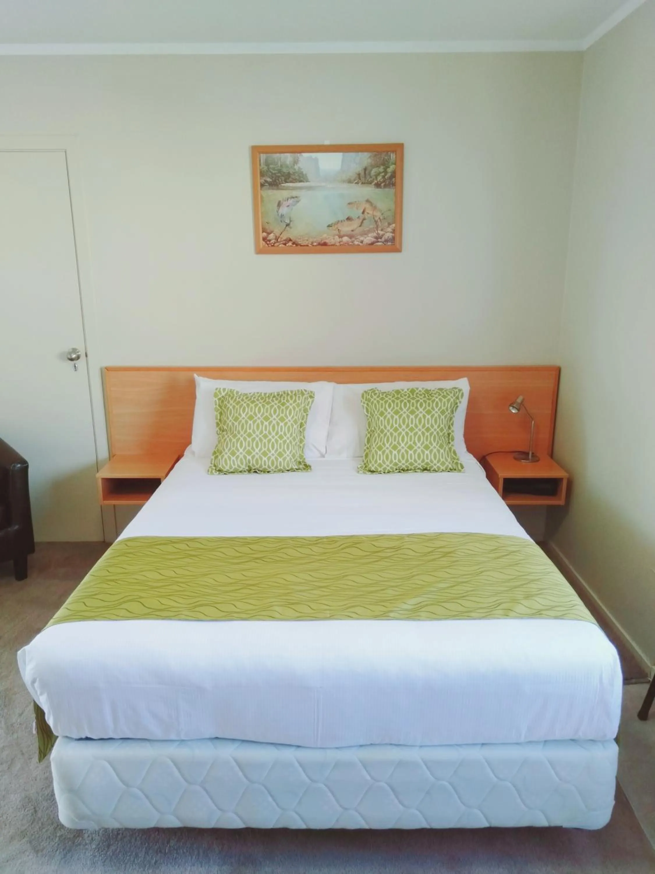 Bed in ASURE Macy's Motor Inn