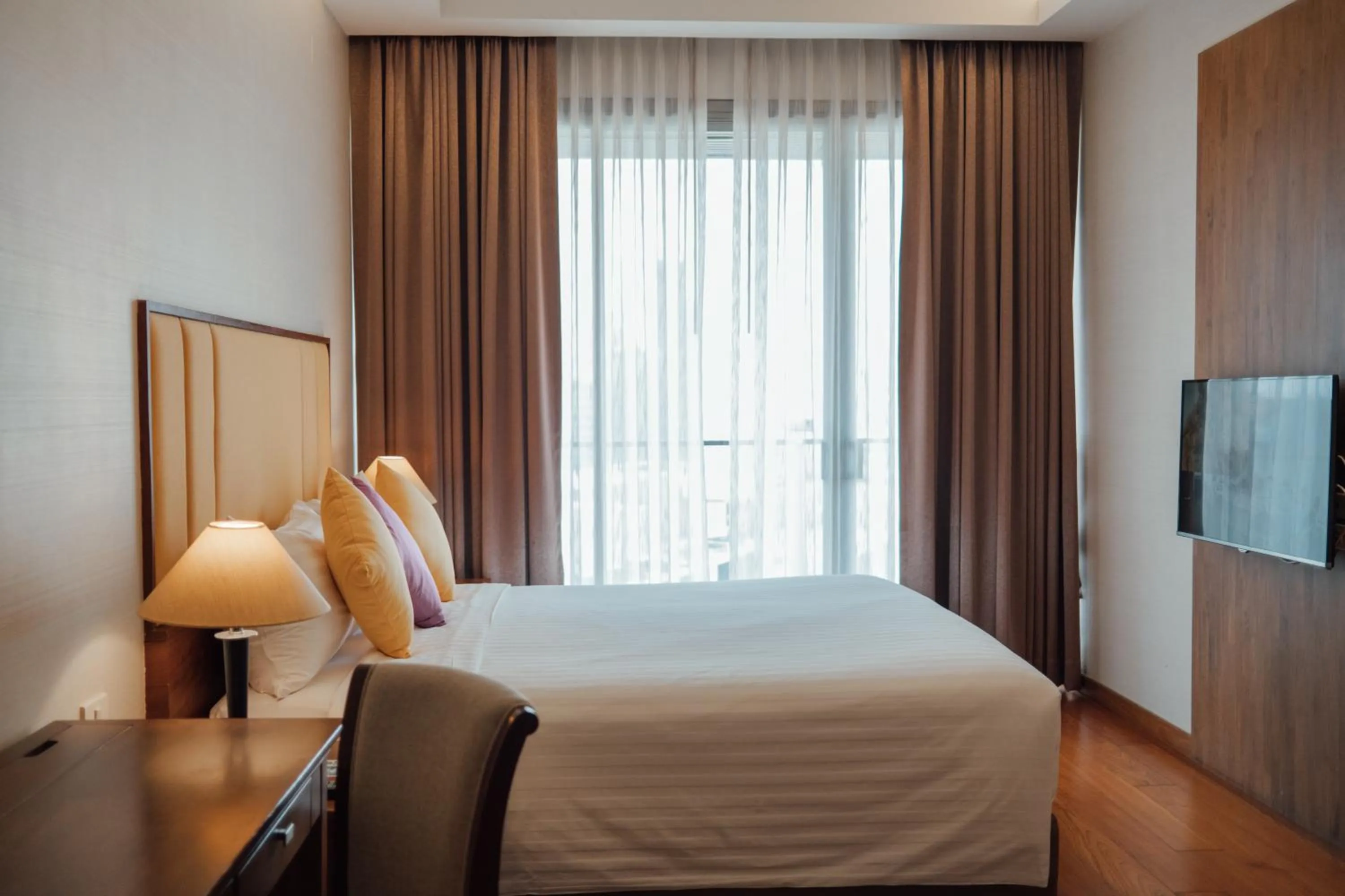 Bed in Column Bangkok Hotel