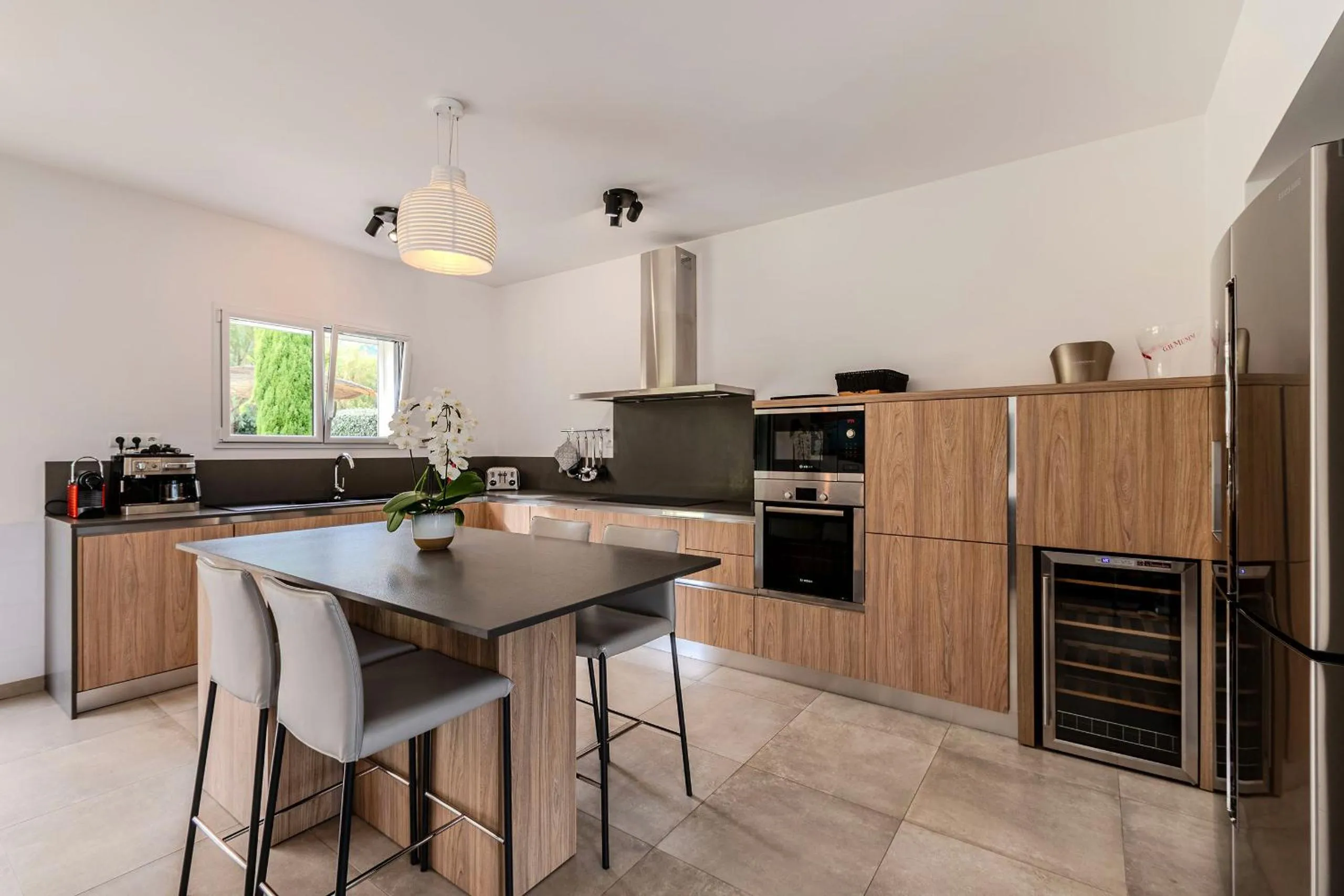 Kitchen or kitchenette in Domaine Villas Mandarine Private Pools & Spa