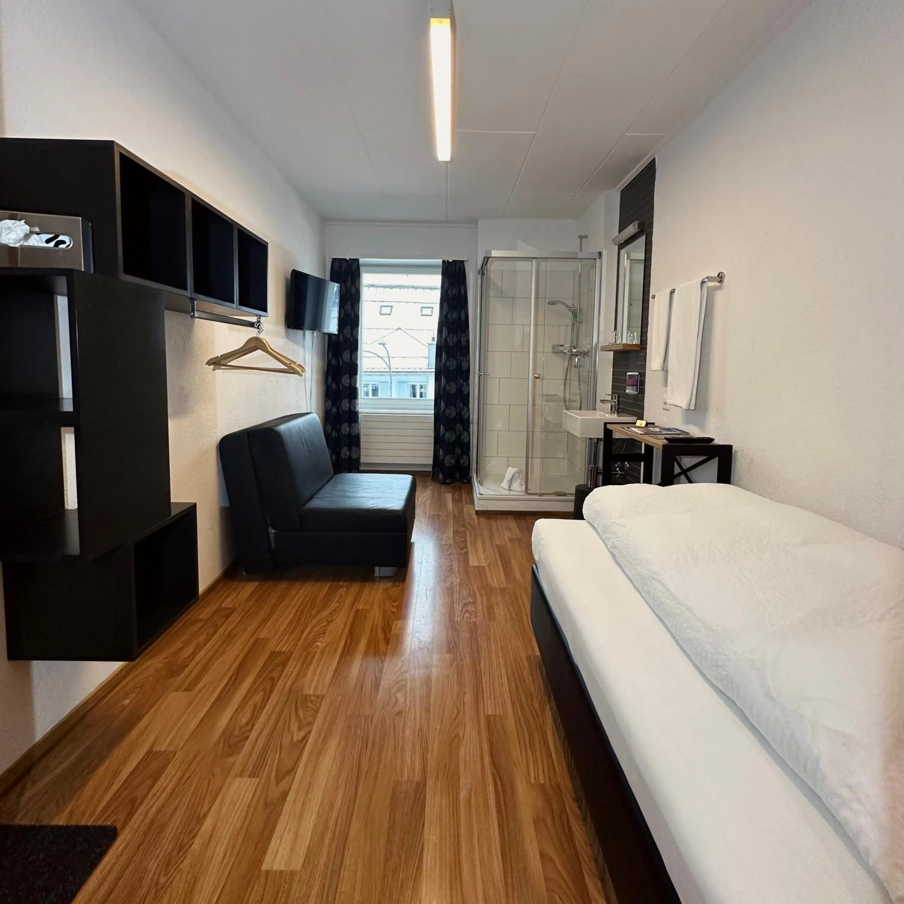 Photo of the whole room, Bed in Hotel Rätia