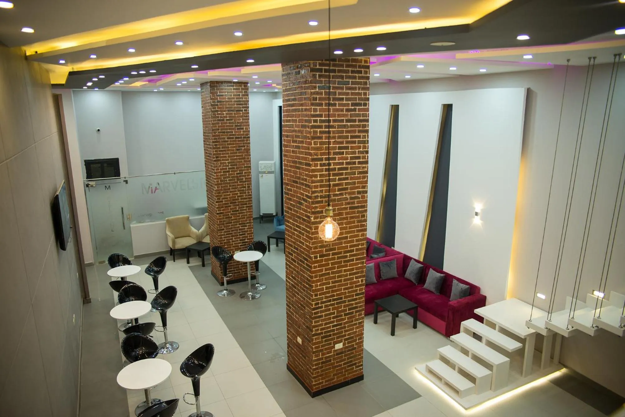 Communal lounge/ TV room in Marvel Stone Hotel