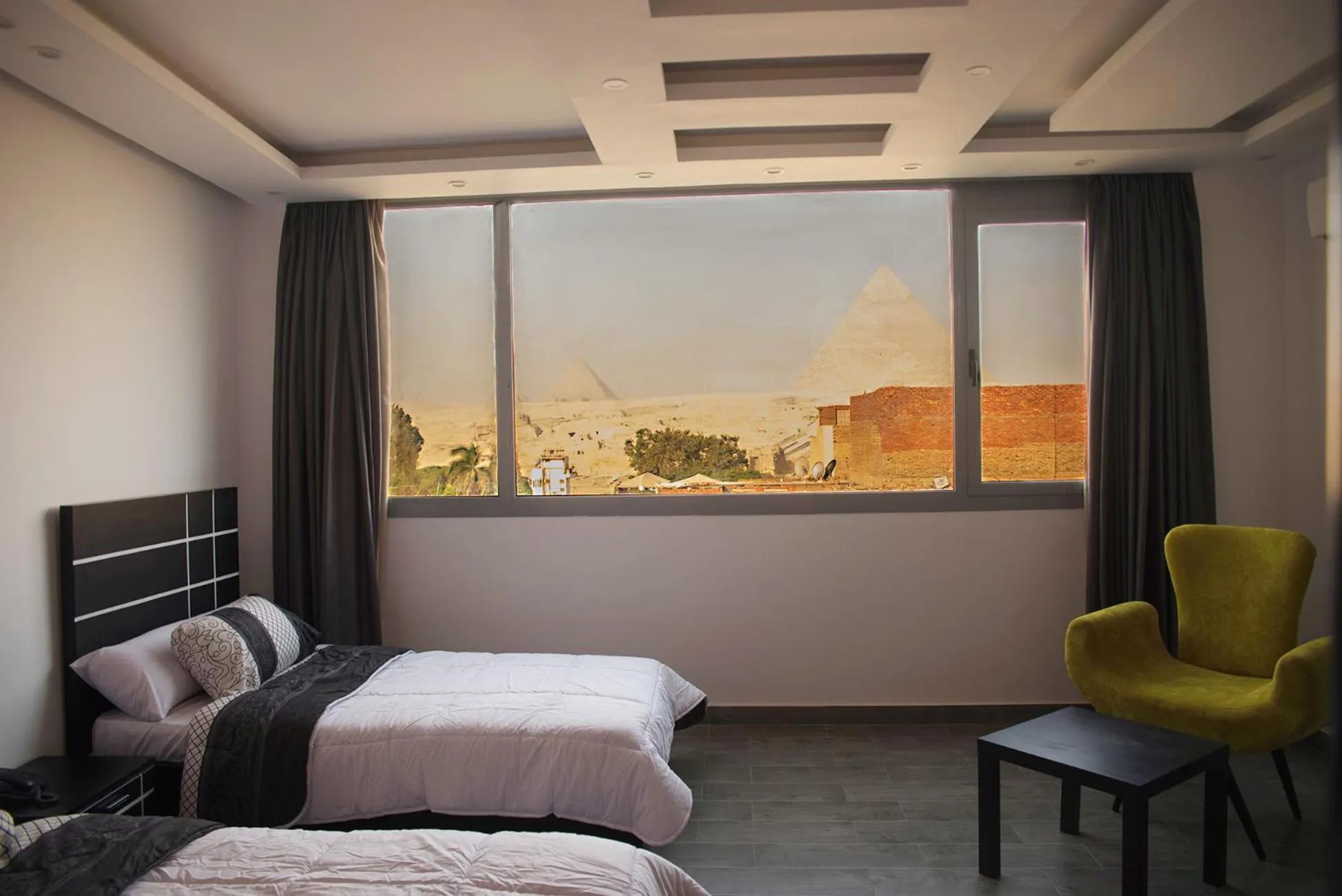 Seating area, Bed in Marvel Stone Hotel