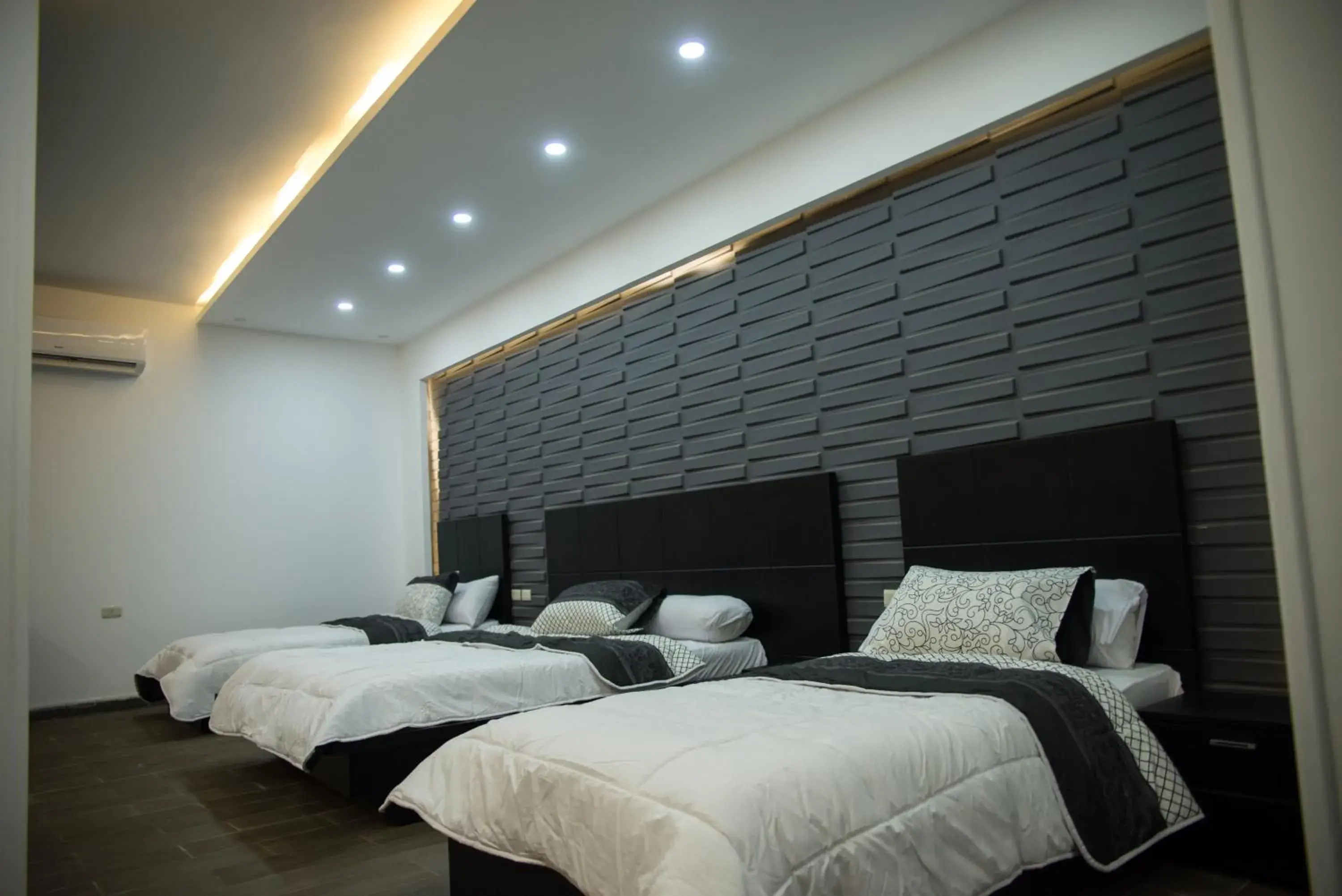 Premium Quadruple Room in Marvel Stone Hotel Premium Quadruple Room in Marvel Stone Hotel