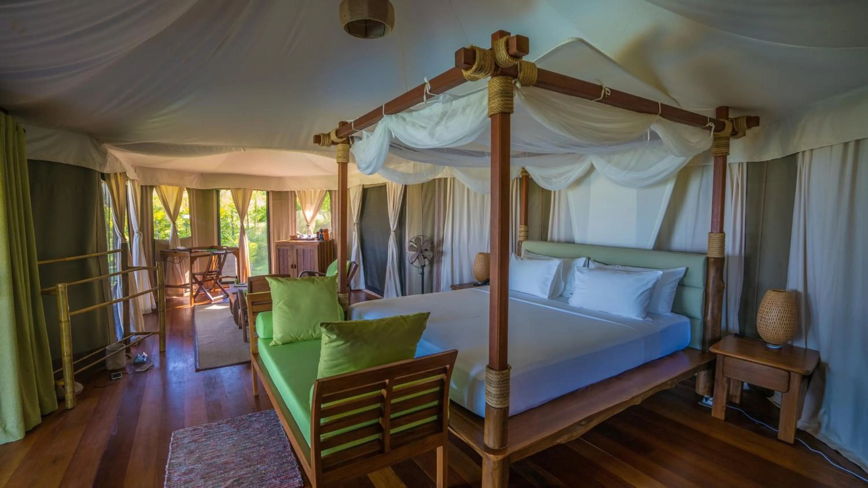 Living room, Bed in 9 Hornbills Tented Camp