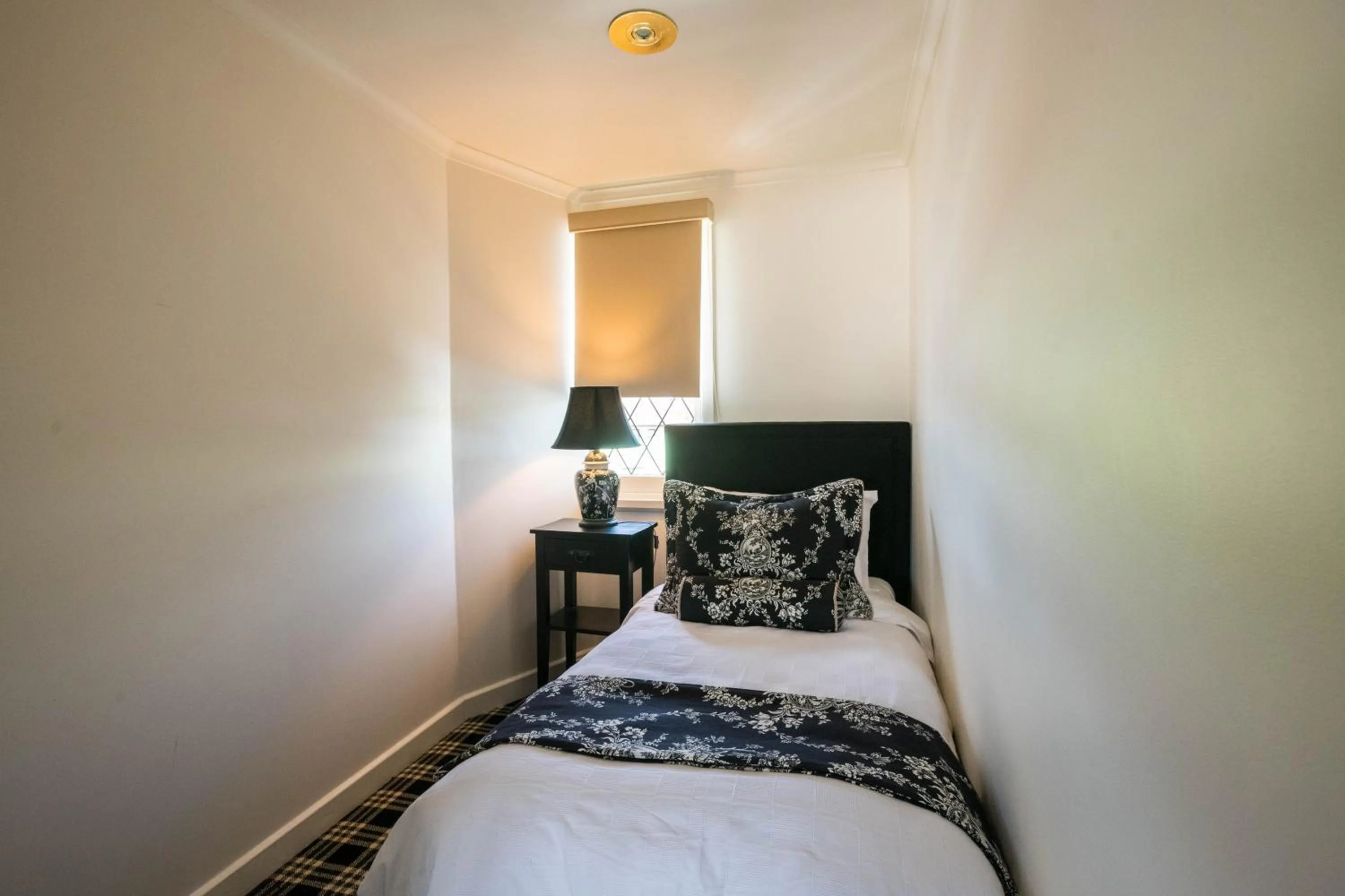 Bed in Battery Point Boutique Accommodation