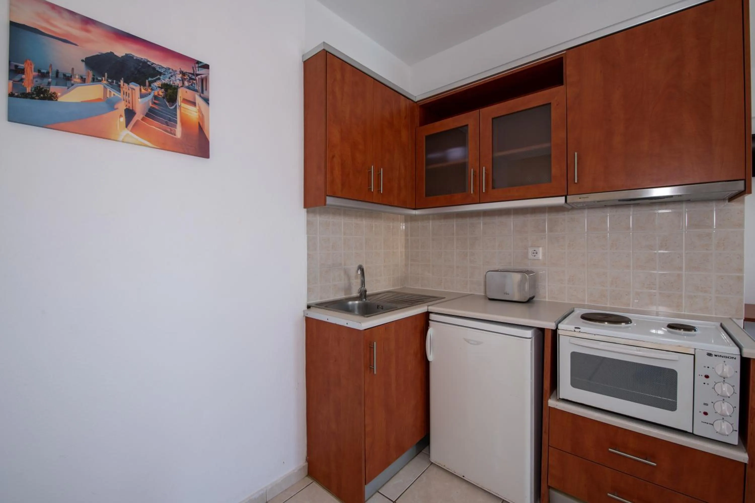 Kitchen or kitchenette in Sunrise Apartments