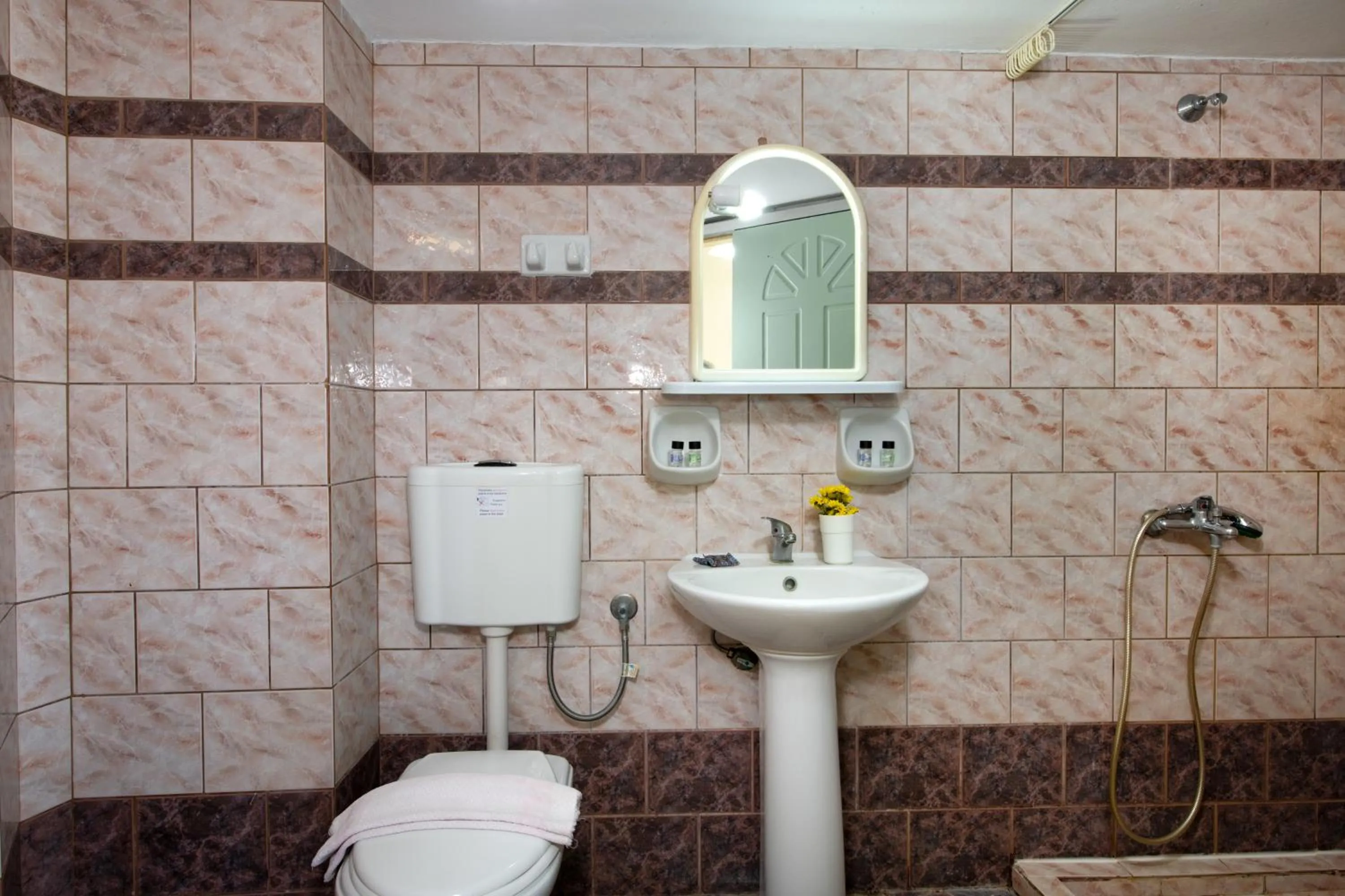 Toilet in Sunrise Apartments