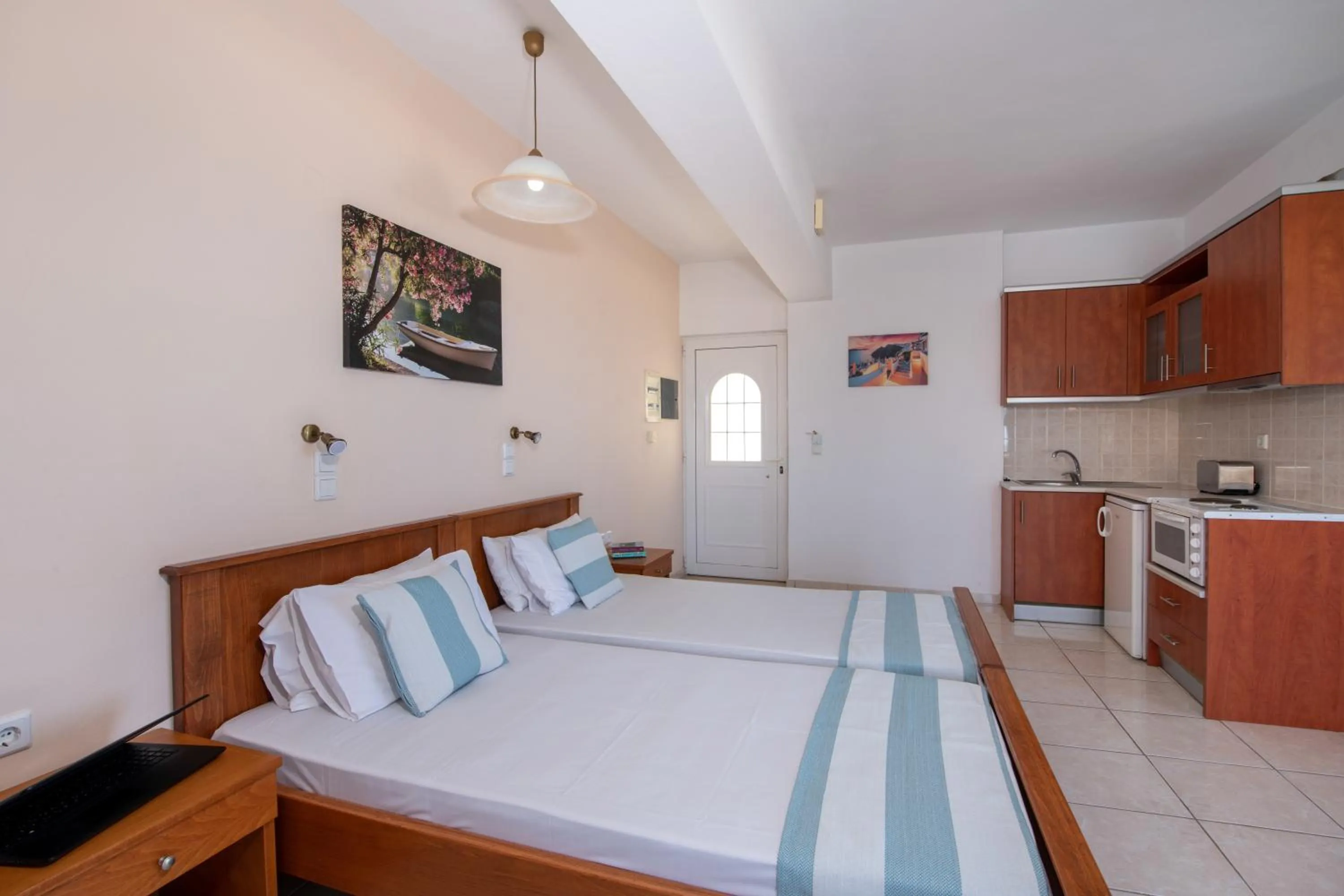 Bed in Sunrise Apartments