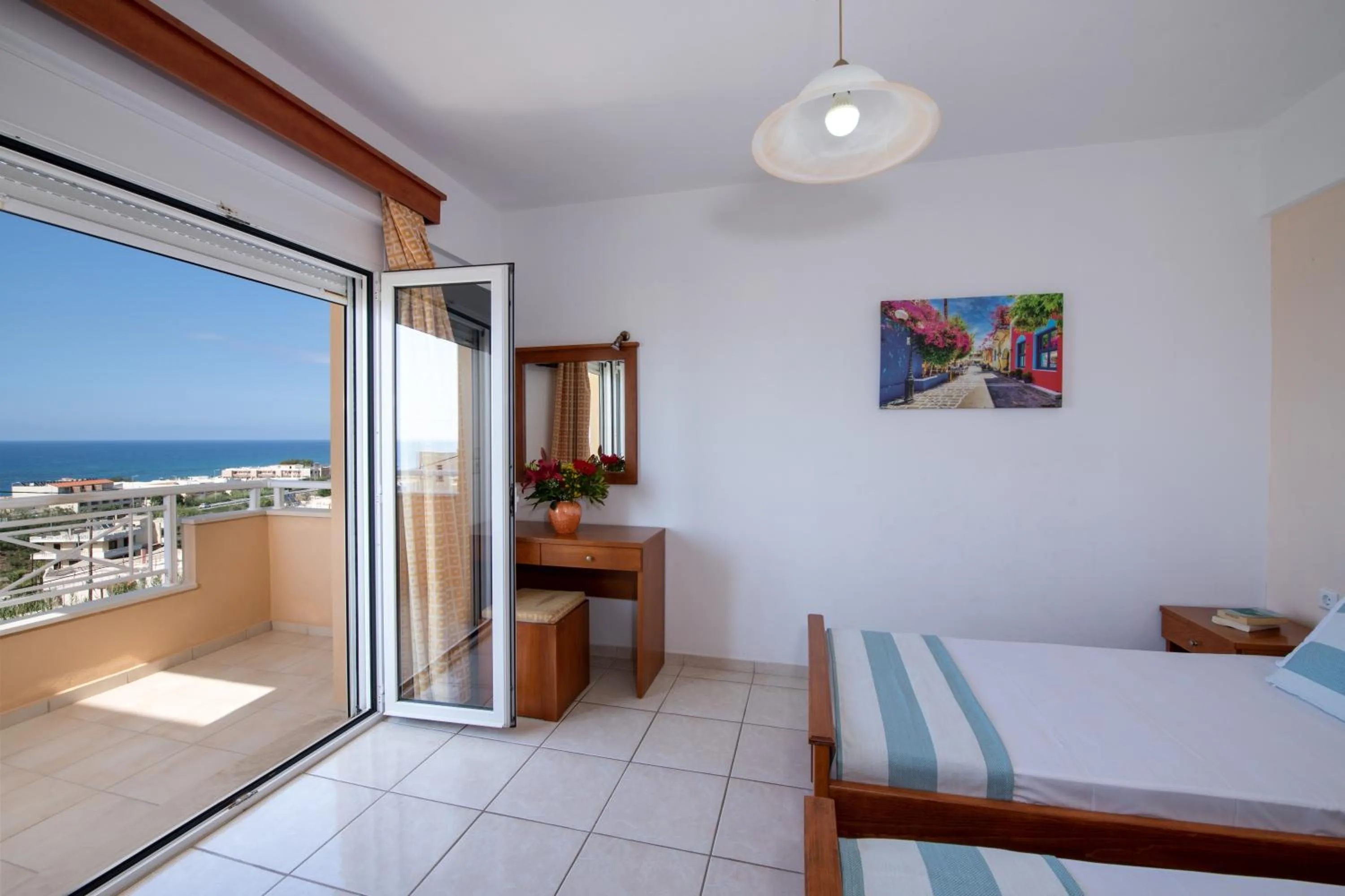 Bed in Sunrise Apartments