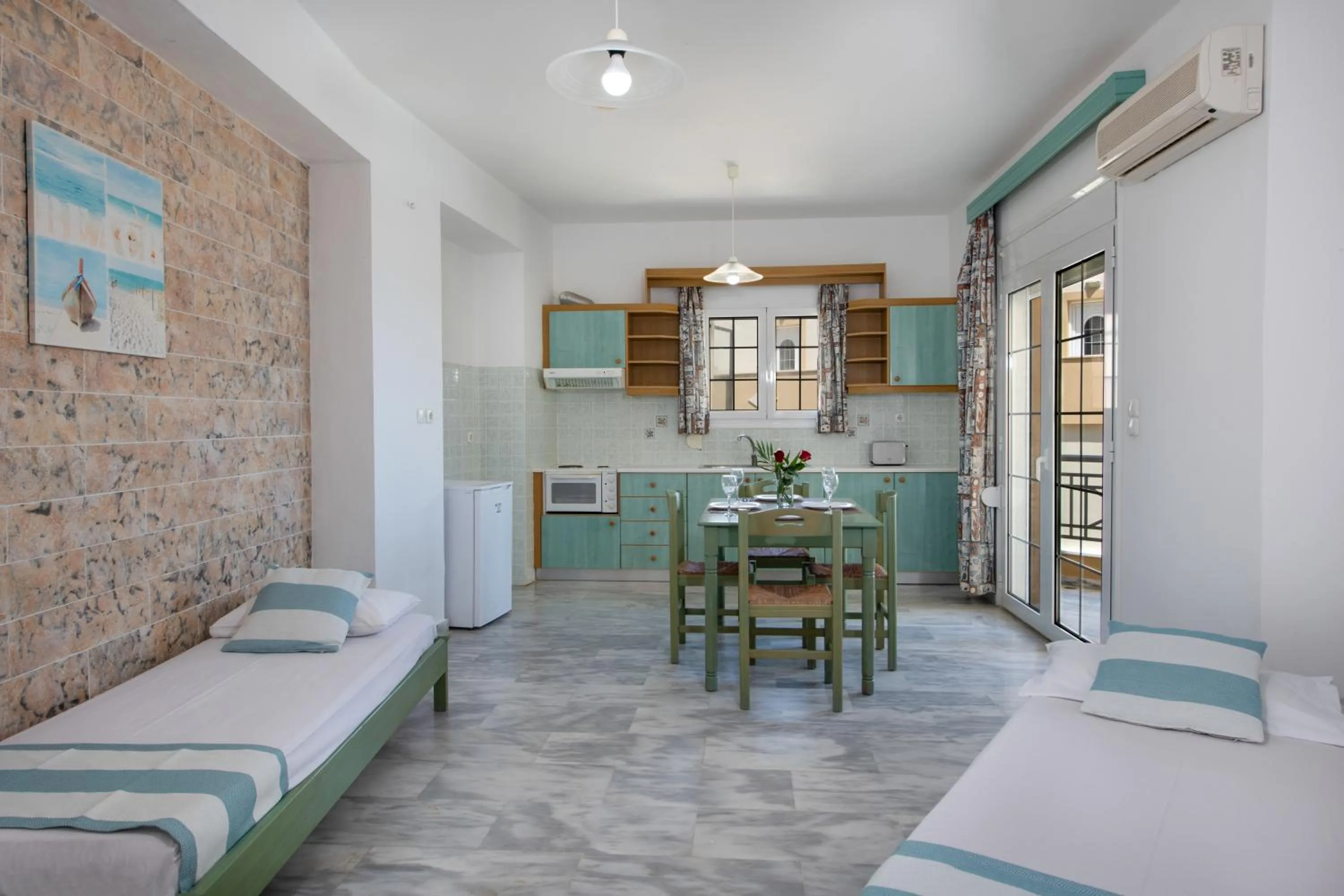 Bed in Sunrise Apartments