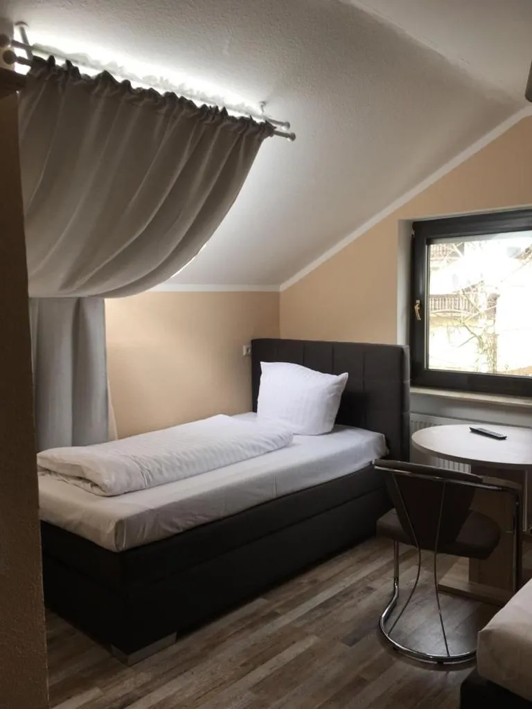 Bed in Hotel-Residenz Oberurseler Hof