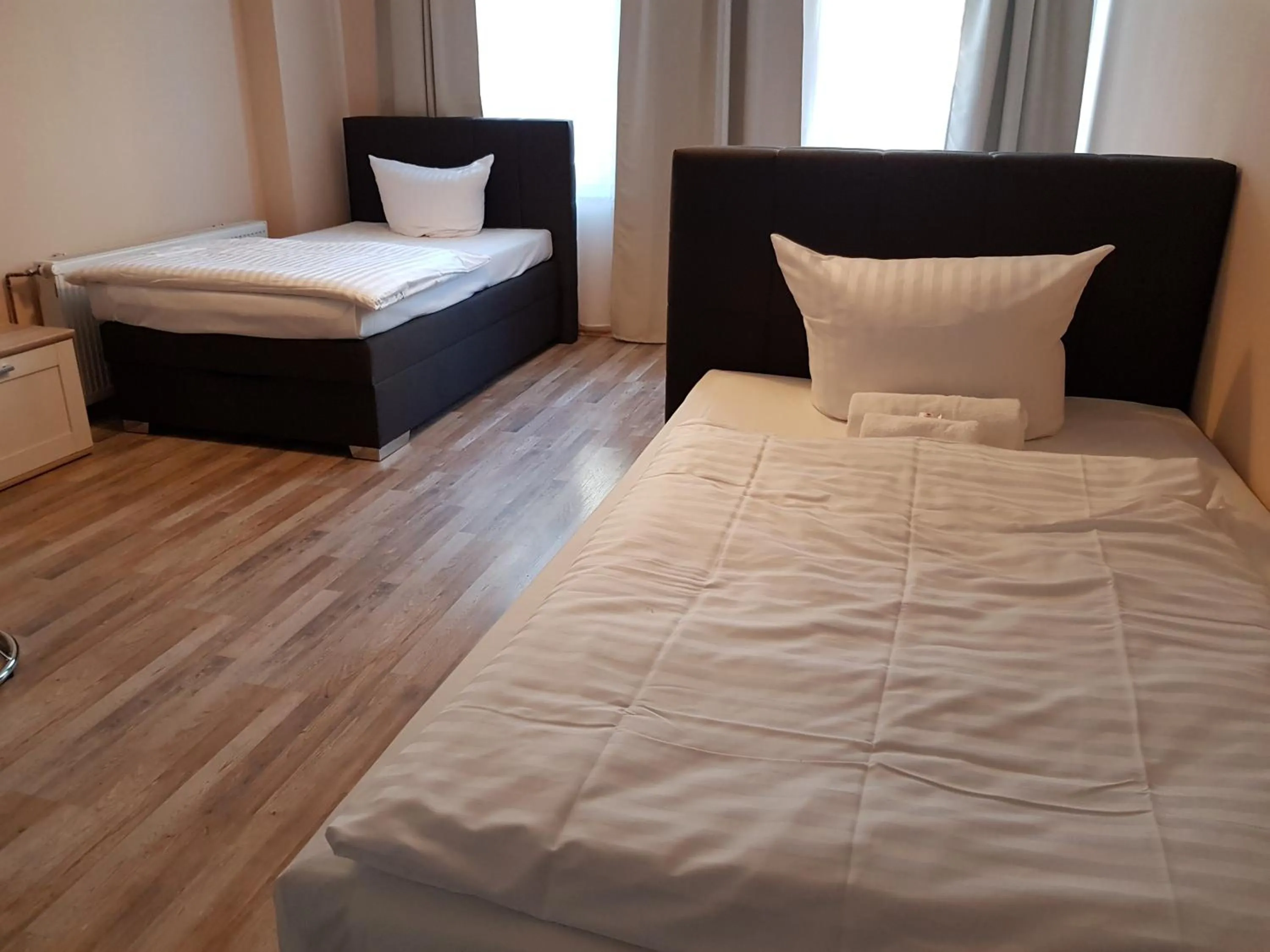 Bed in Hotel-Residenz Oberurseler Hof