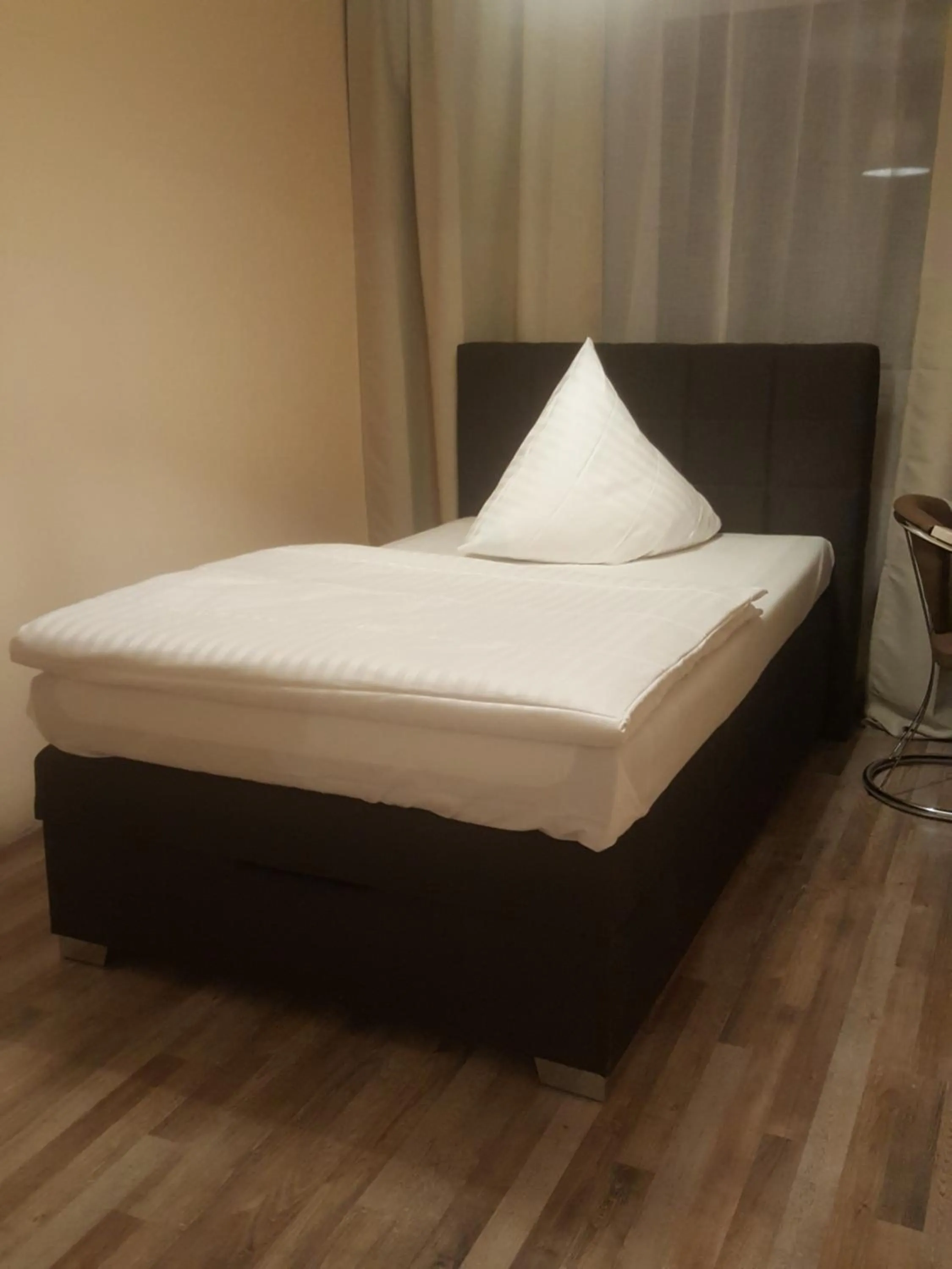 Bed in Hotel-Residenz Oberurseler Hof