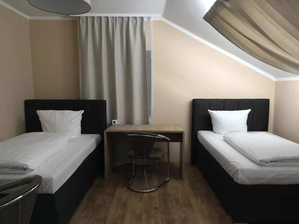 Bed in Hotel-Residenz Oberurseler Hof