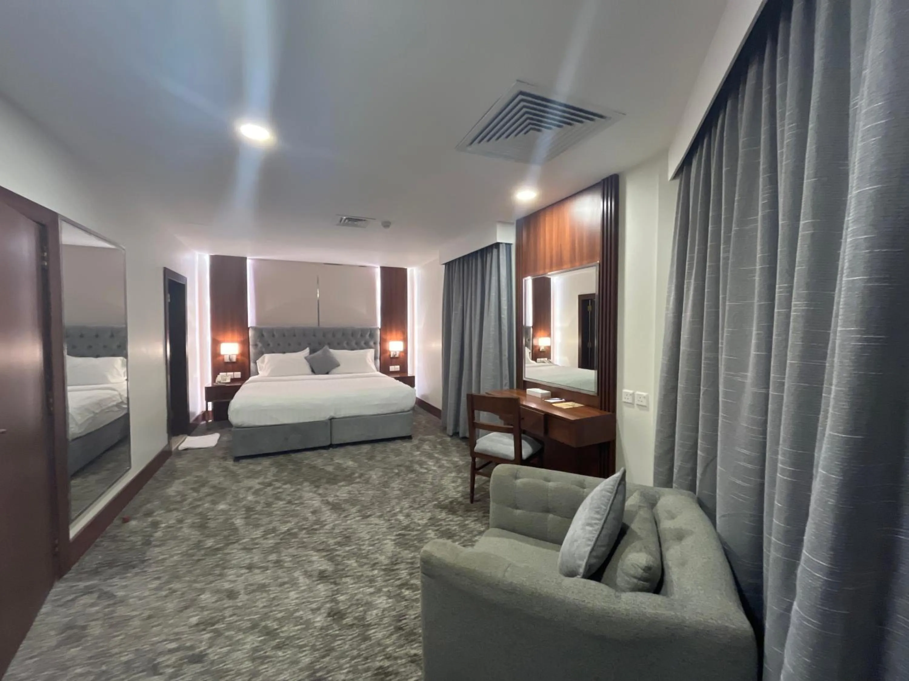 Bed in Lily Hotel Suite Mubarraz