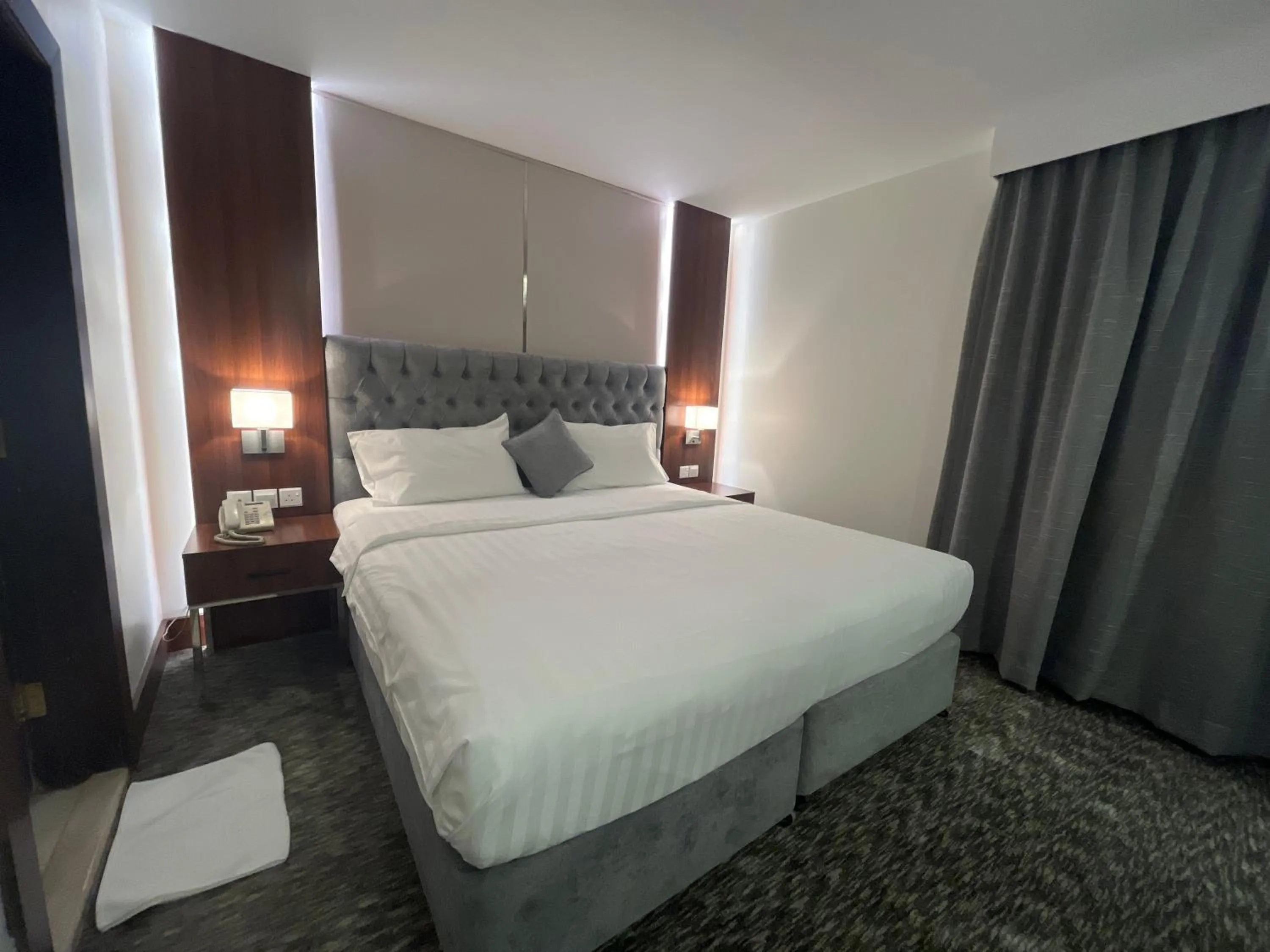 Bed in Lily Hotel Suite Mubarraz