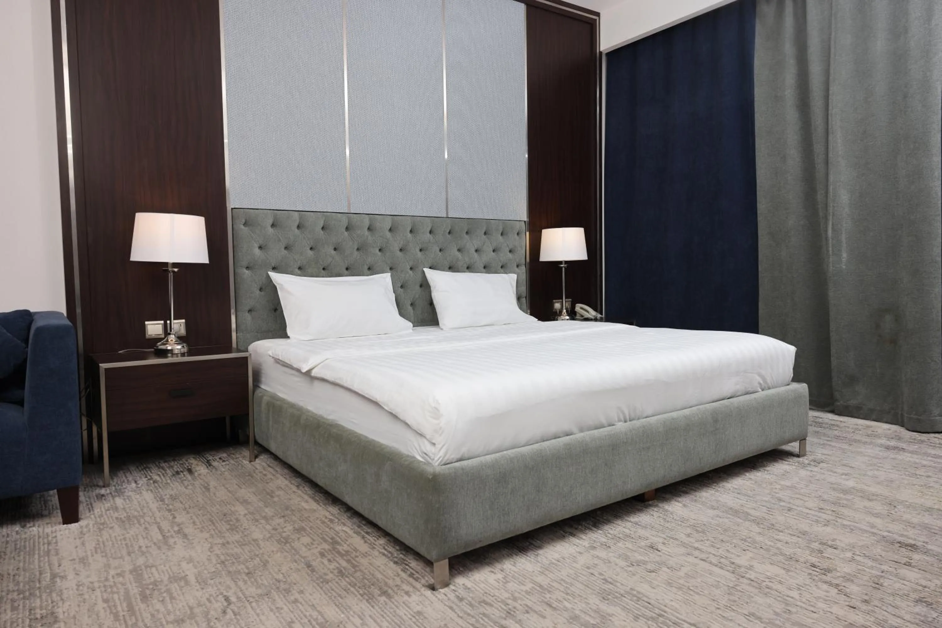 Bed in Lily Hotel Suite Mubarraz