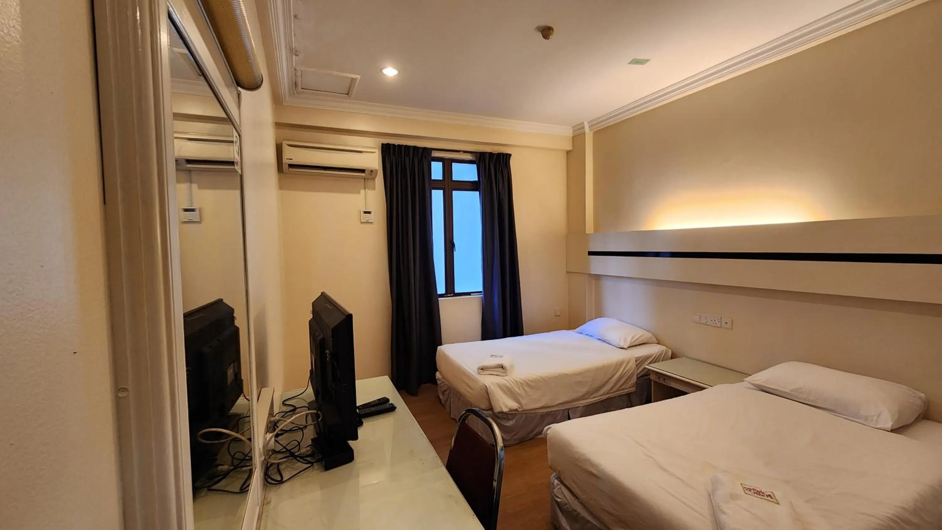 Bed in Fair Park Hotel