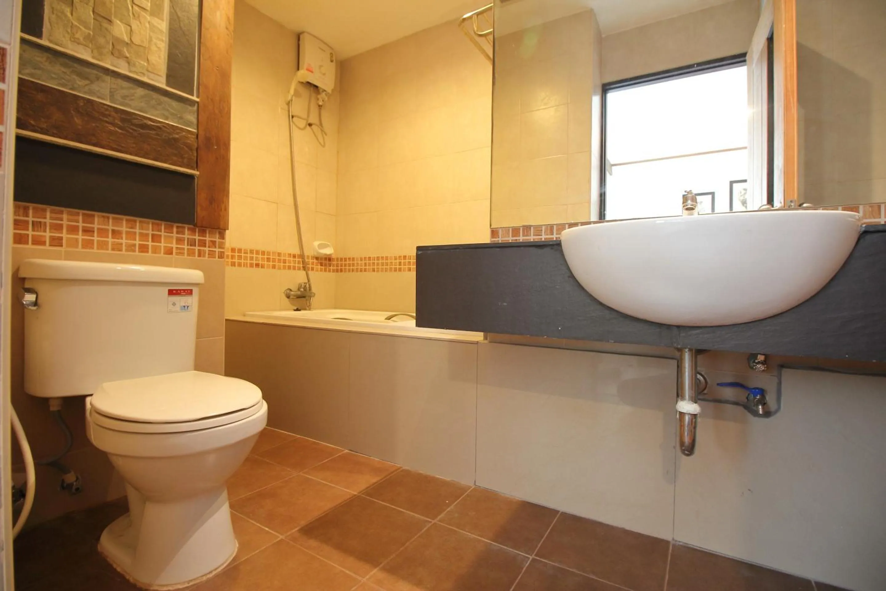 Bathroom in Super OYO Capital O 564 Nature Boutique Hotel