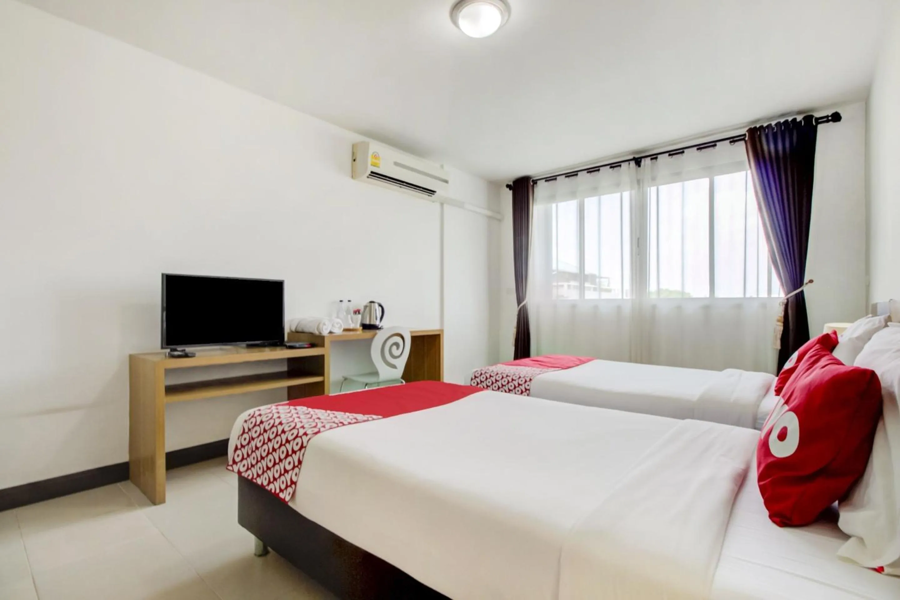 Bedroom in Super OYO Capital O 564 Nature Boutique Hotel