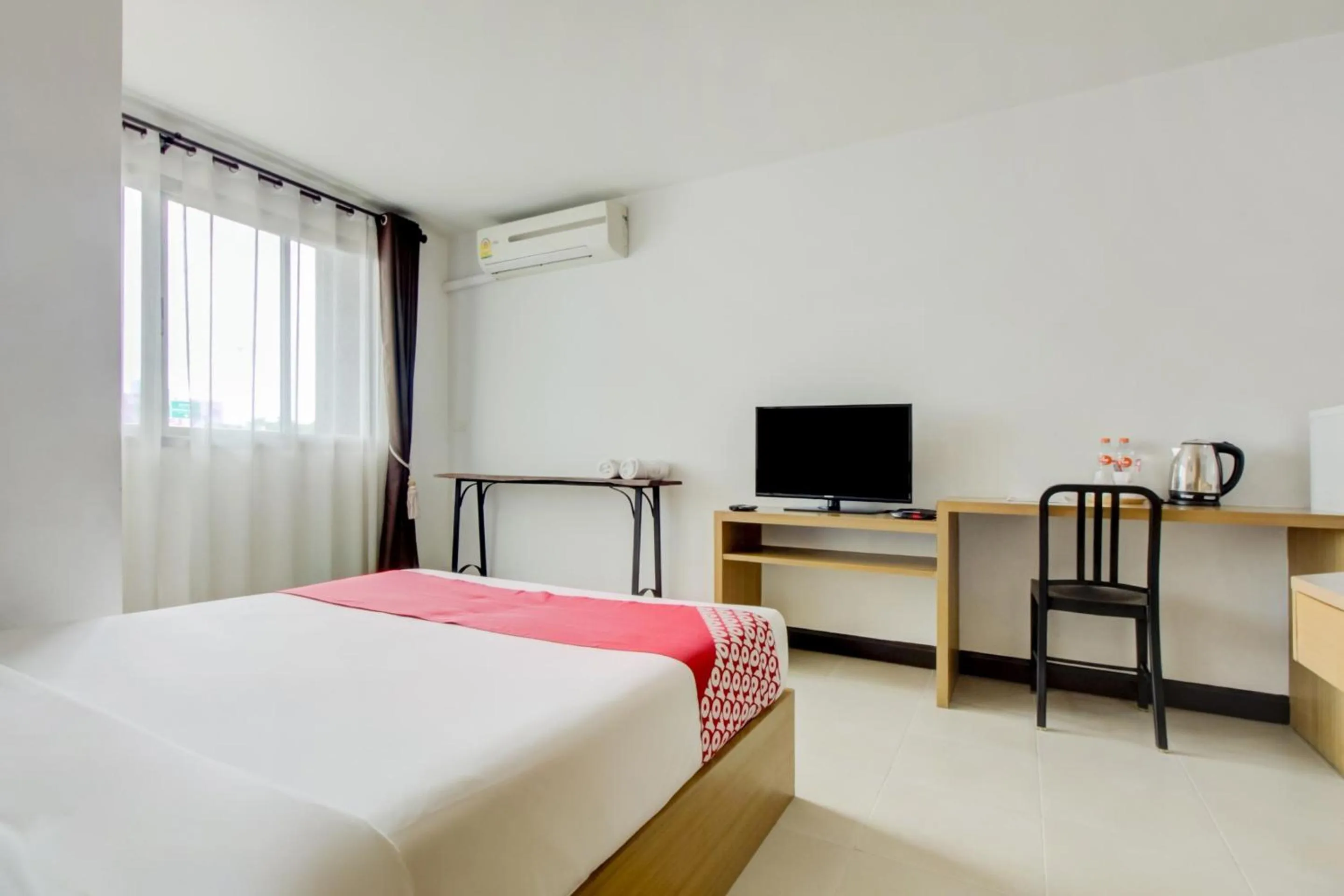 Bedroom in Super OYO Capital O 564 Nature Boutique Hotel