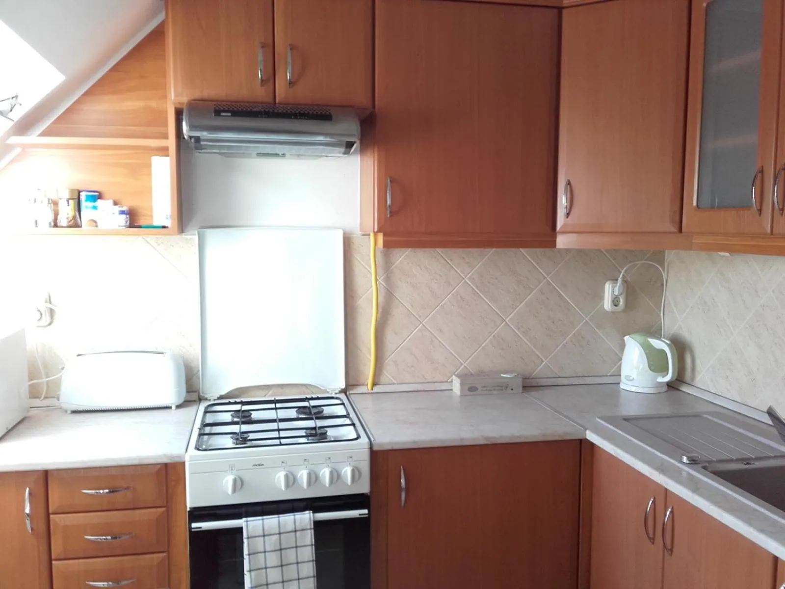 Kitchen or kitchenette in Éger Apartman