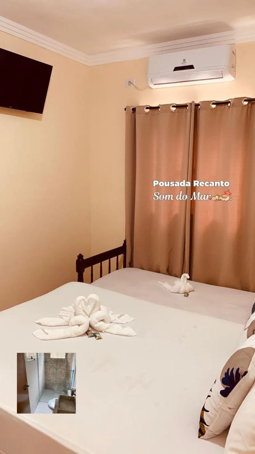 Bed in Pousada Recanto Som do Mar